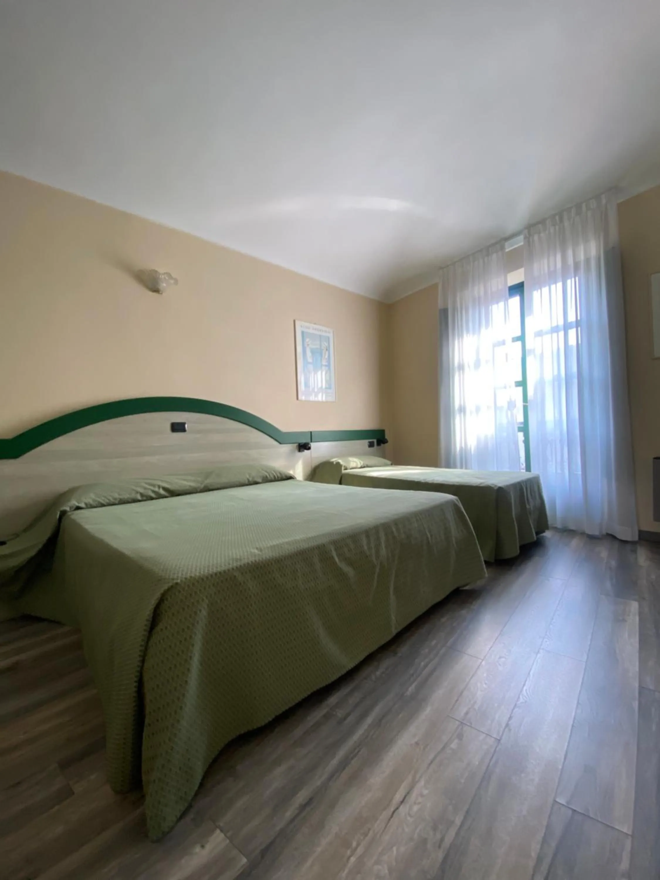 Bed in Hotel Rainero