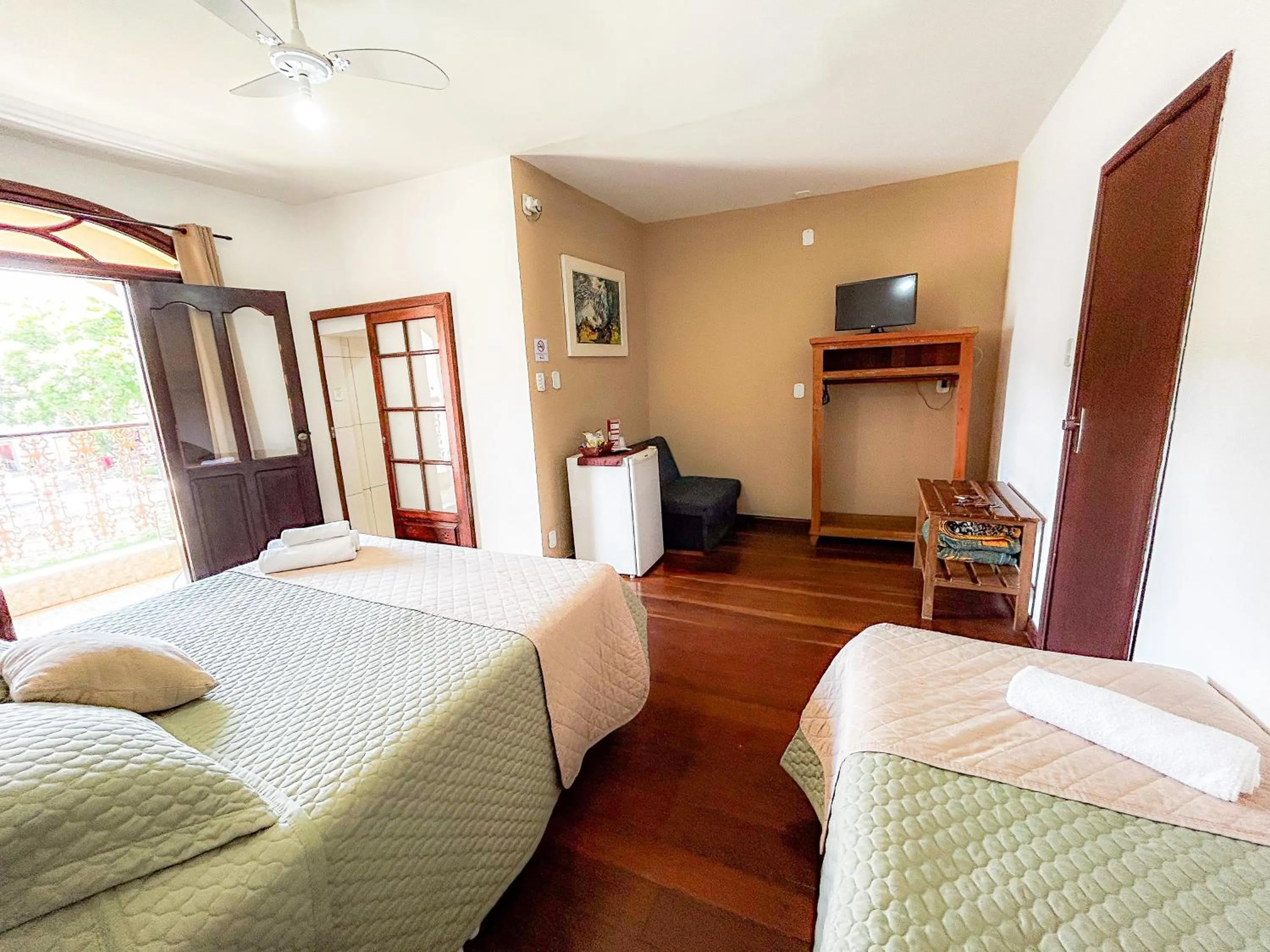 Bed in Pousada dos Sinos