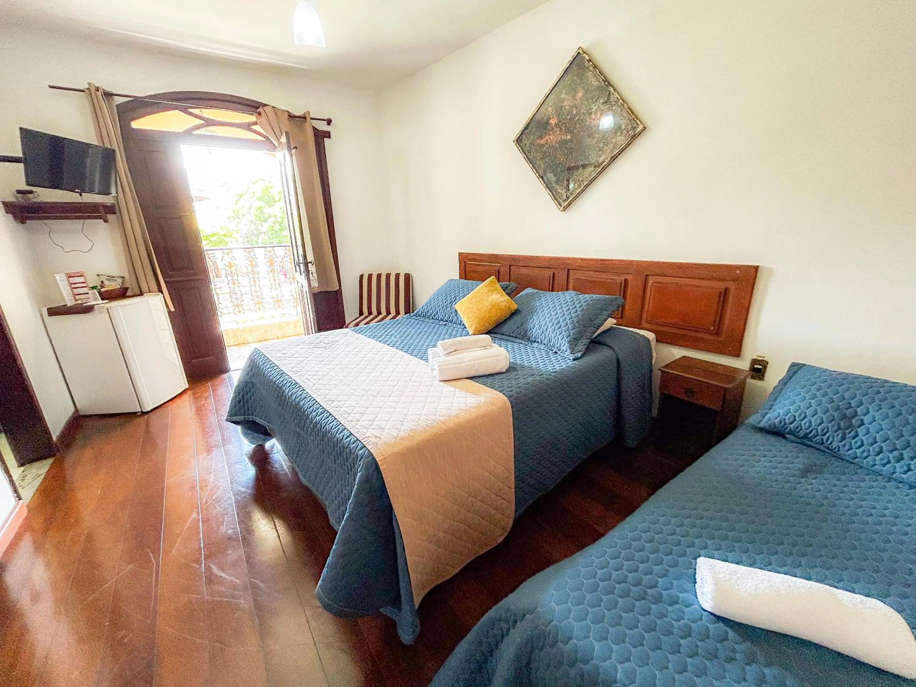 Bed in Pousada dos Sinos