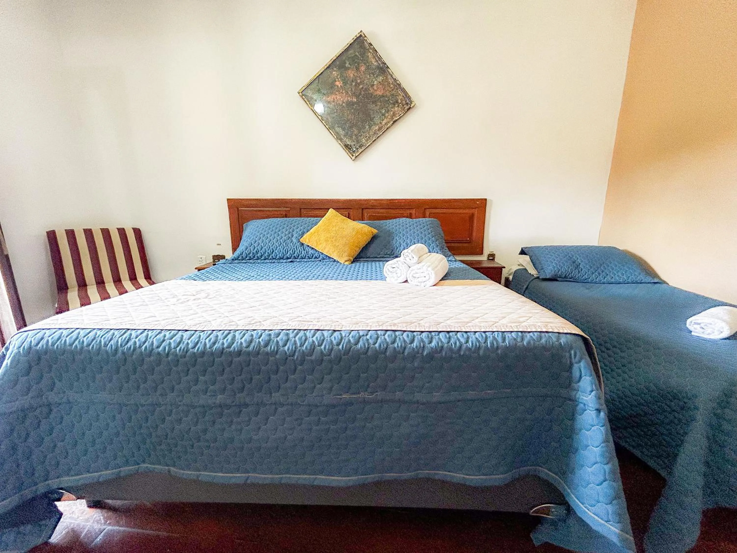 Bed in Pousada dos Sinos