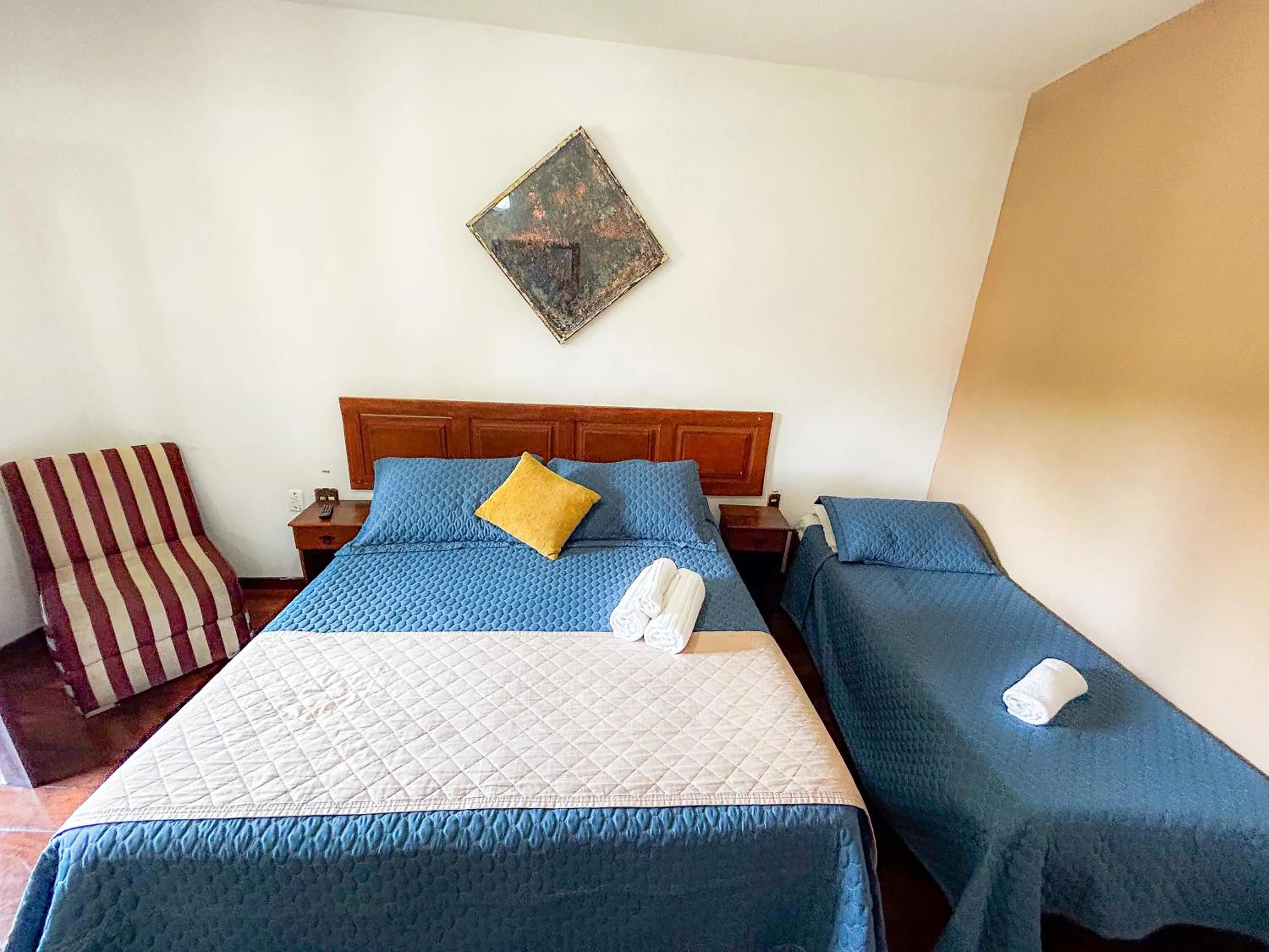 Bed in Pousada dos Sinos