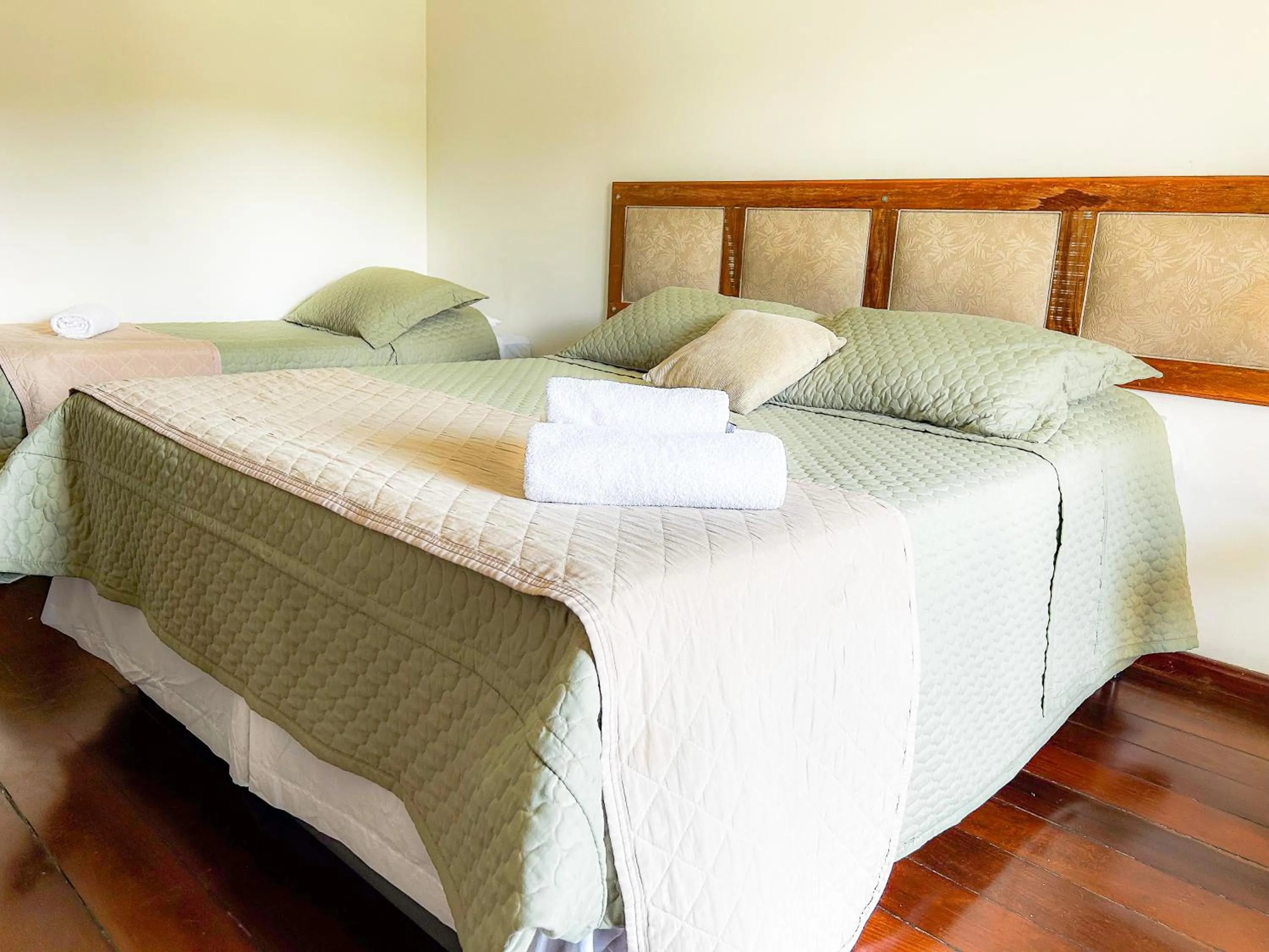 Bed in Pousada dos Sinos