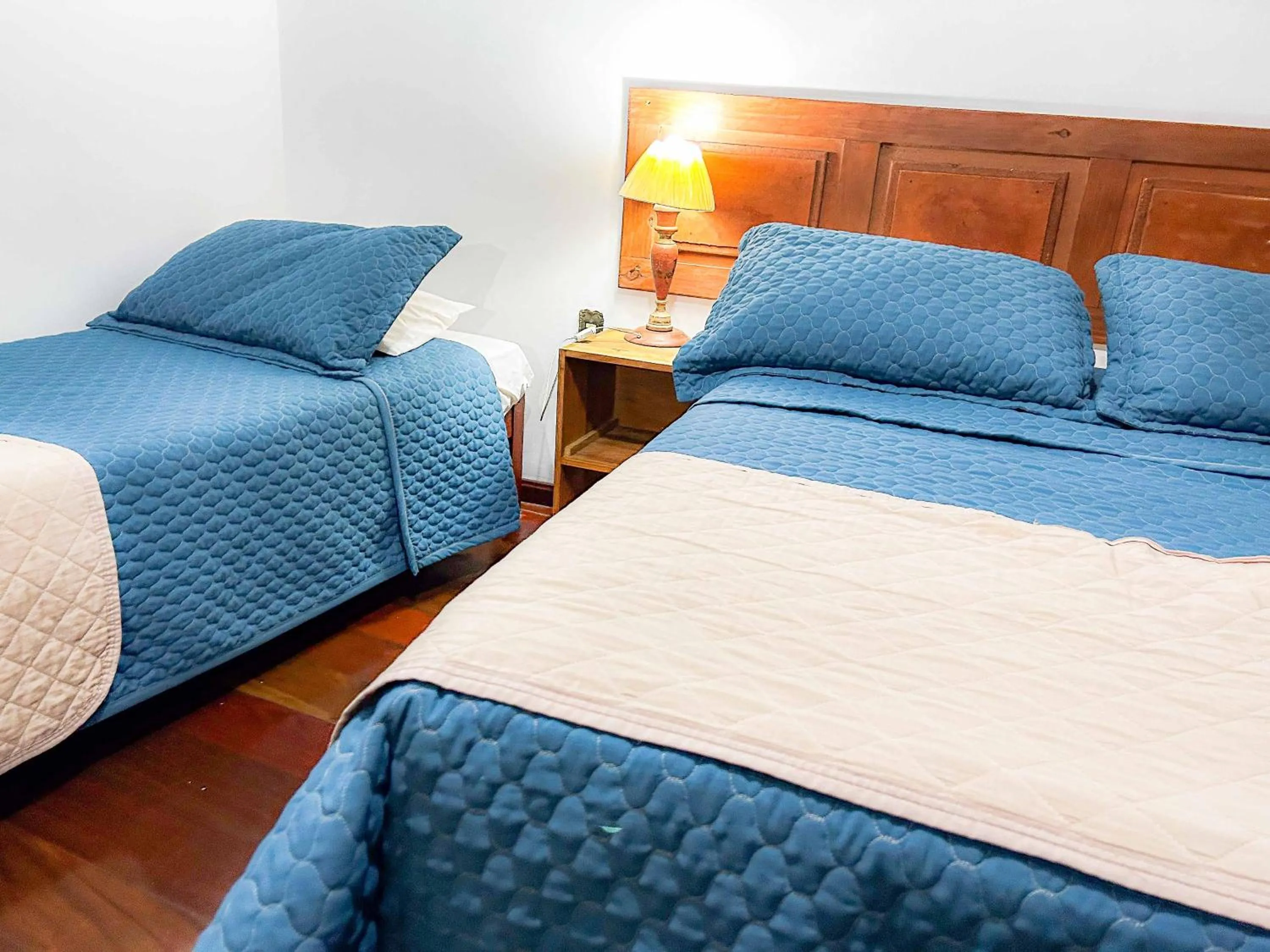 Bed in Pousada dos Sinos