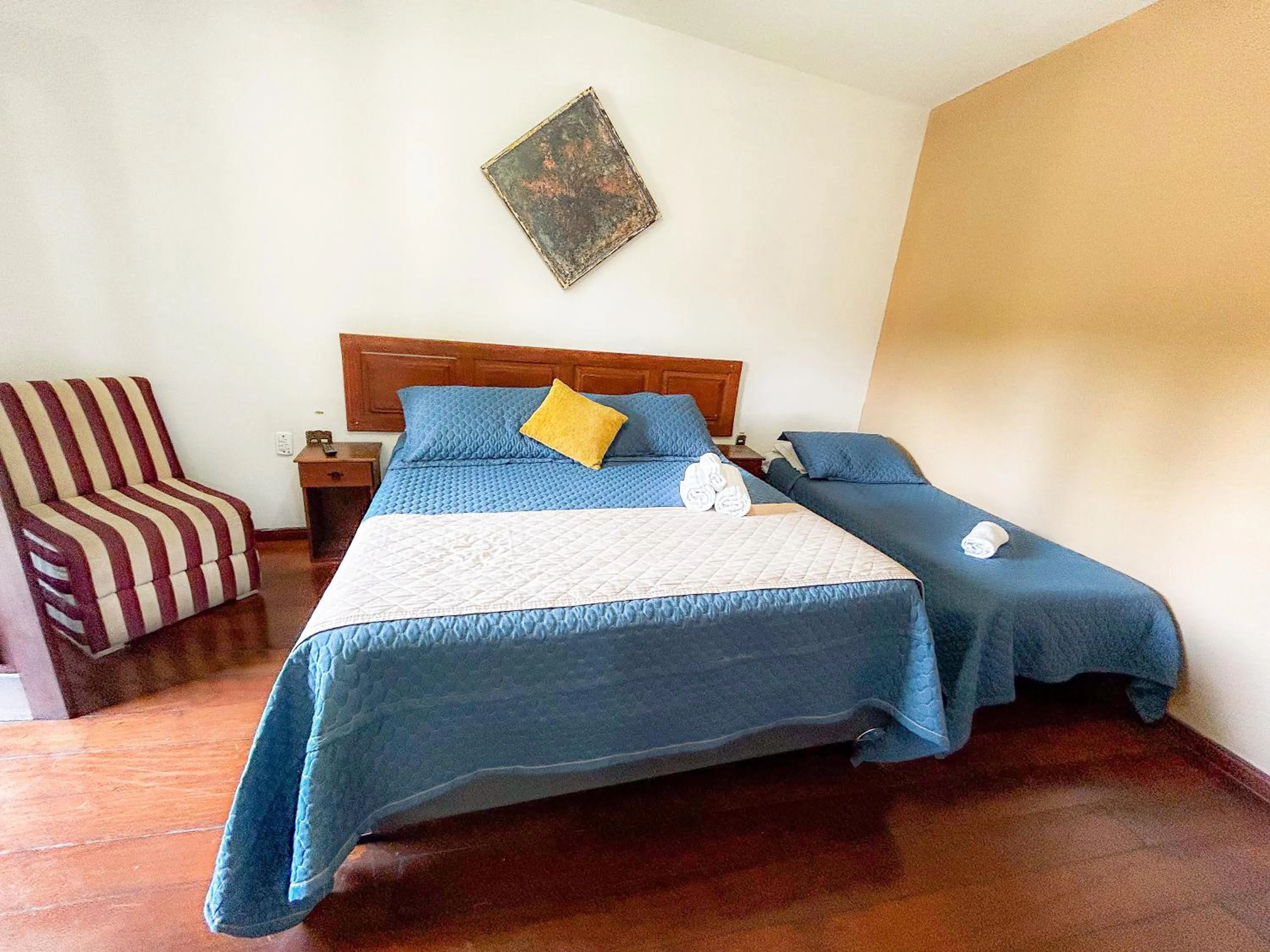 Bed in Pousada dos Sinos