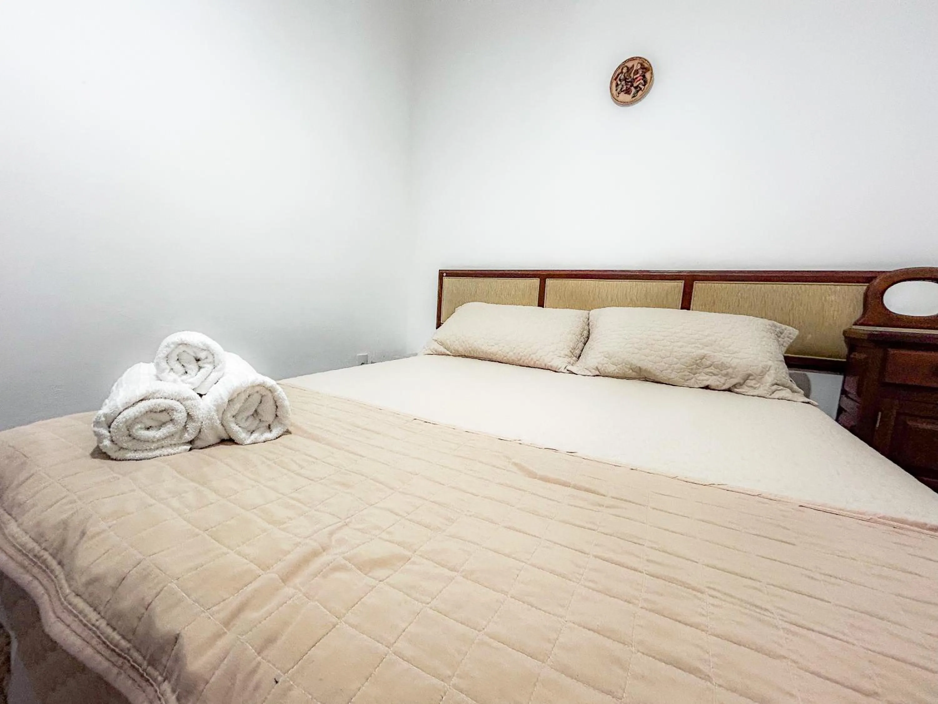 Bed in Pousada dos Sinos