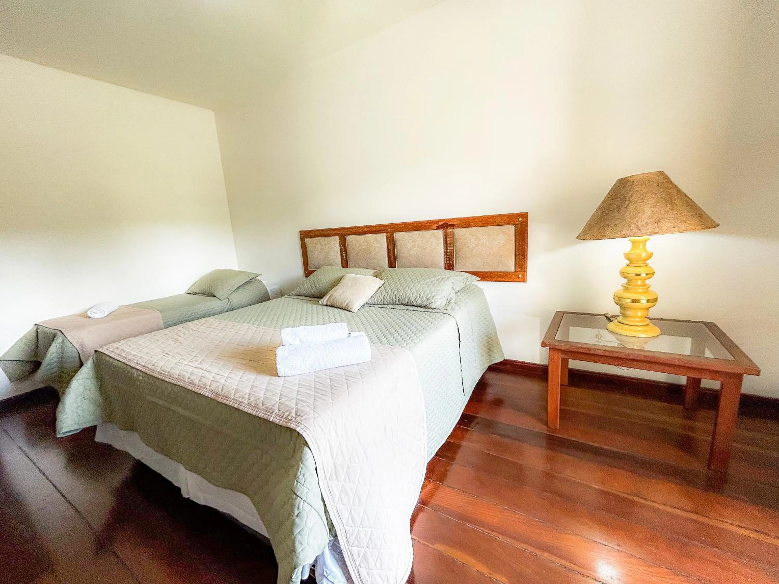 Bed in Pousada dos Sinos