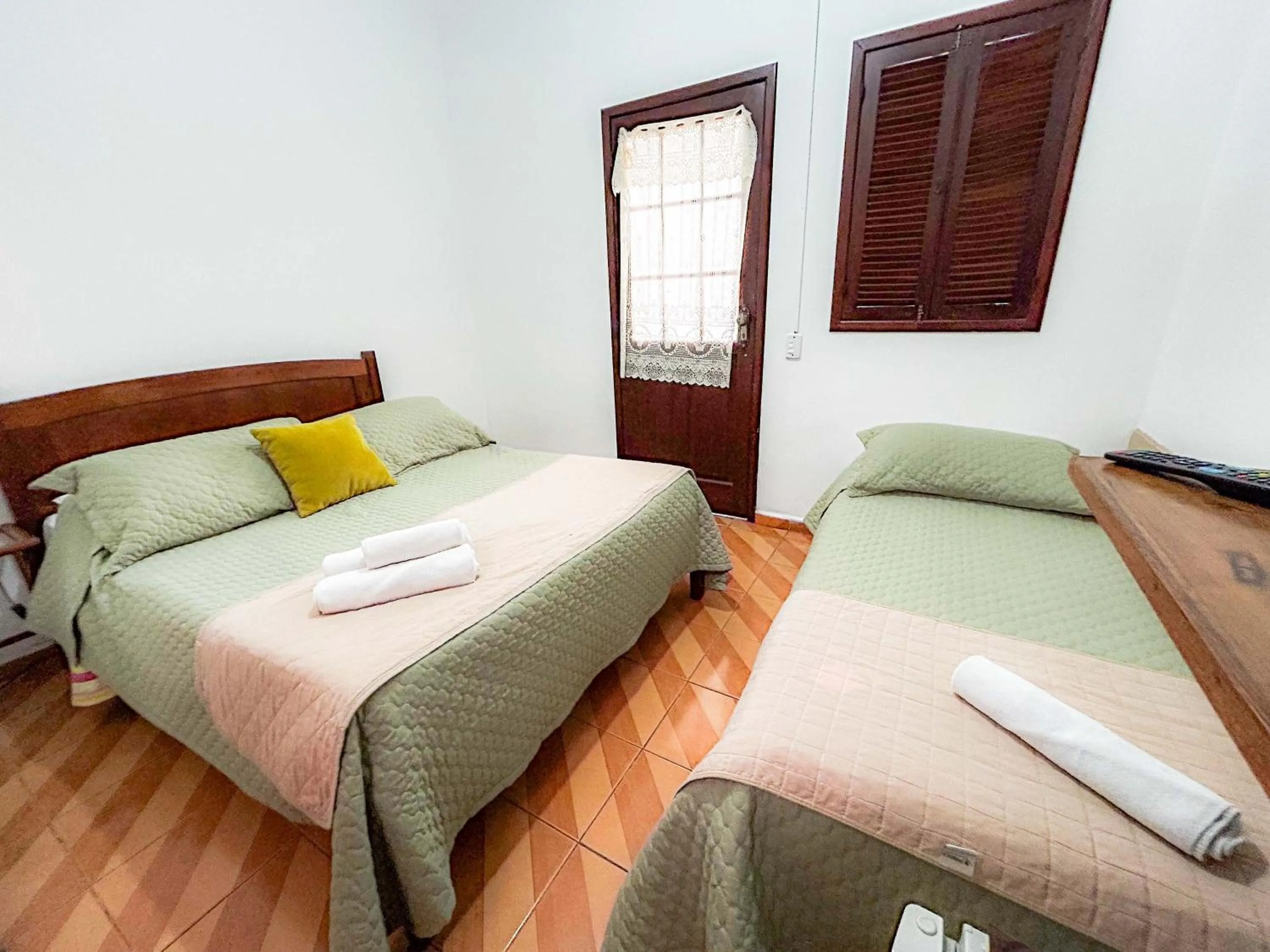 Bed in Pousada dos Sinos