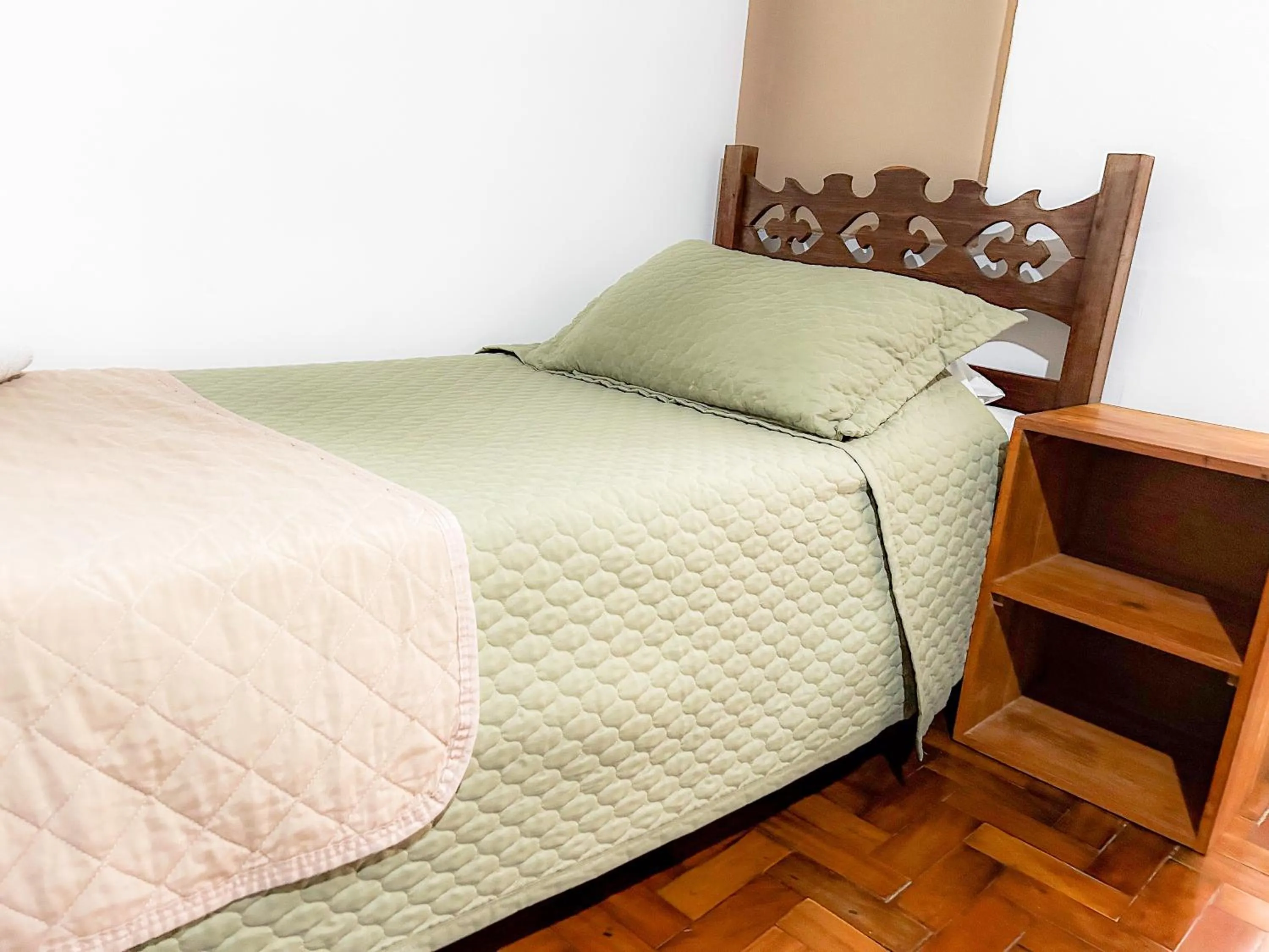 Bed in Pousada dos Sinos