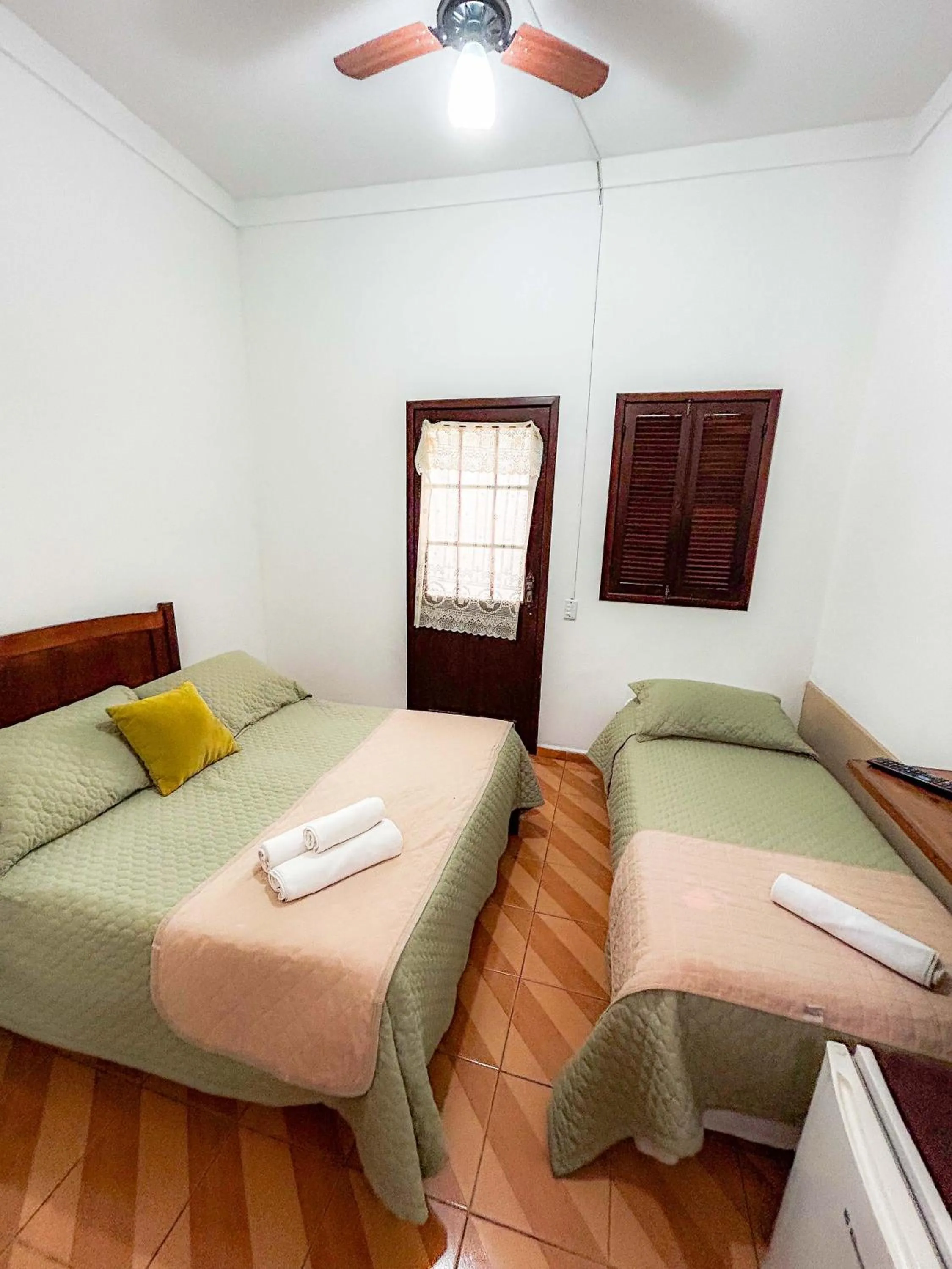 Bed in Pousada dos Sinos