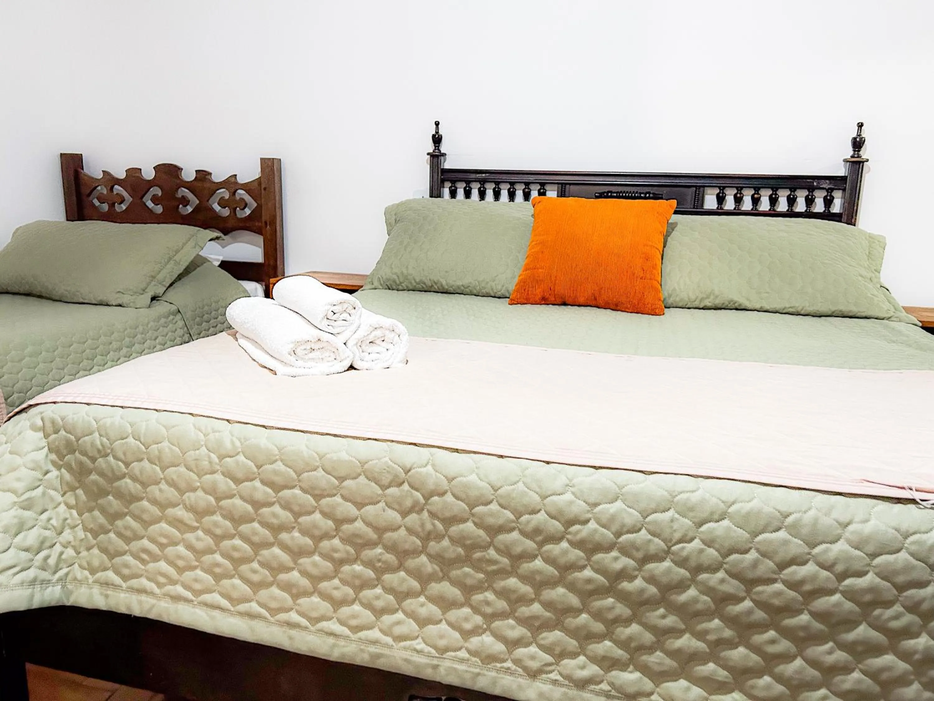 Bed in Pousada dos Sinos