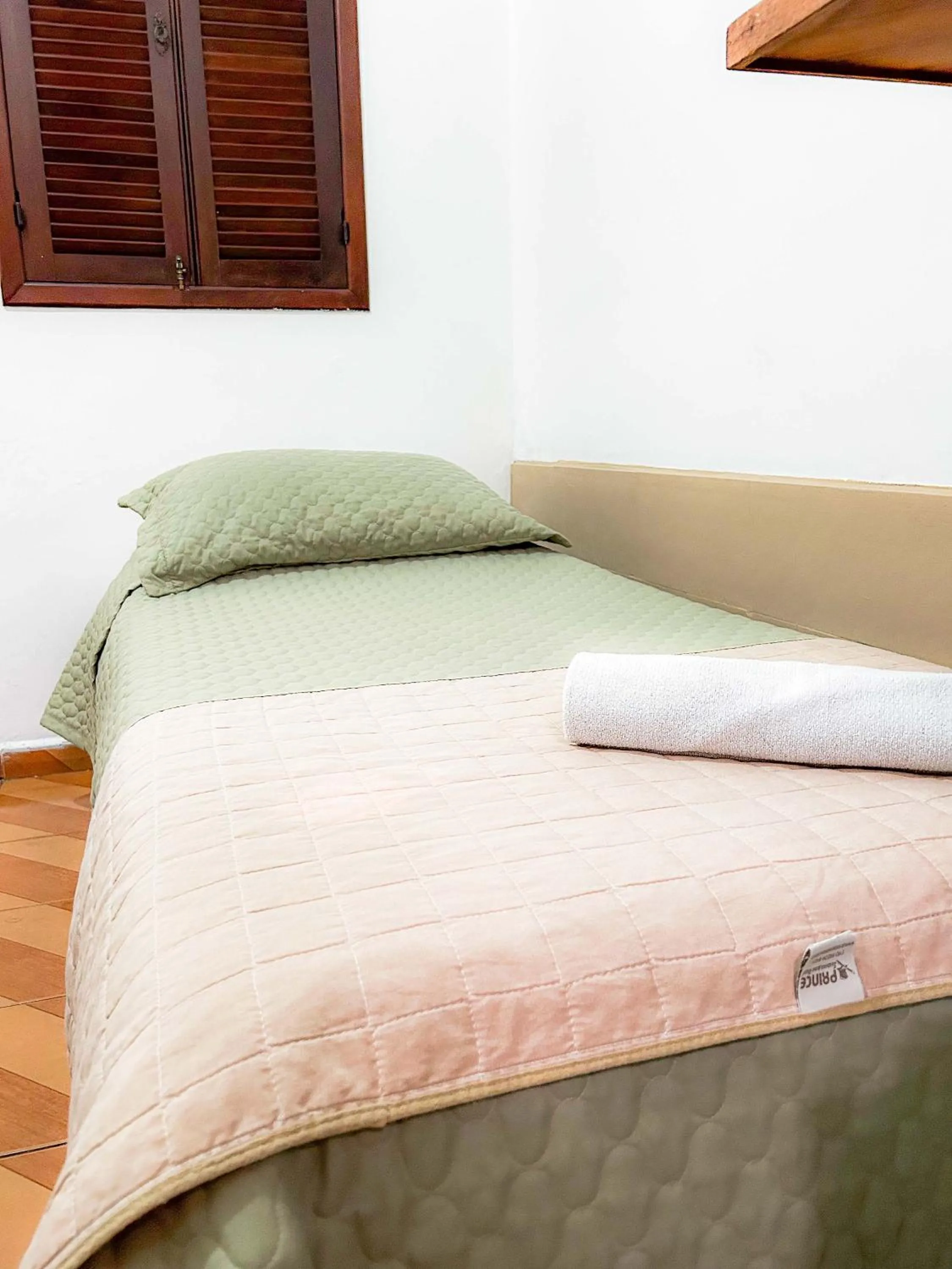 Bed in Pousada dos Sinos