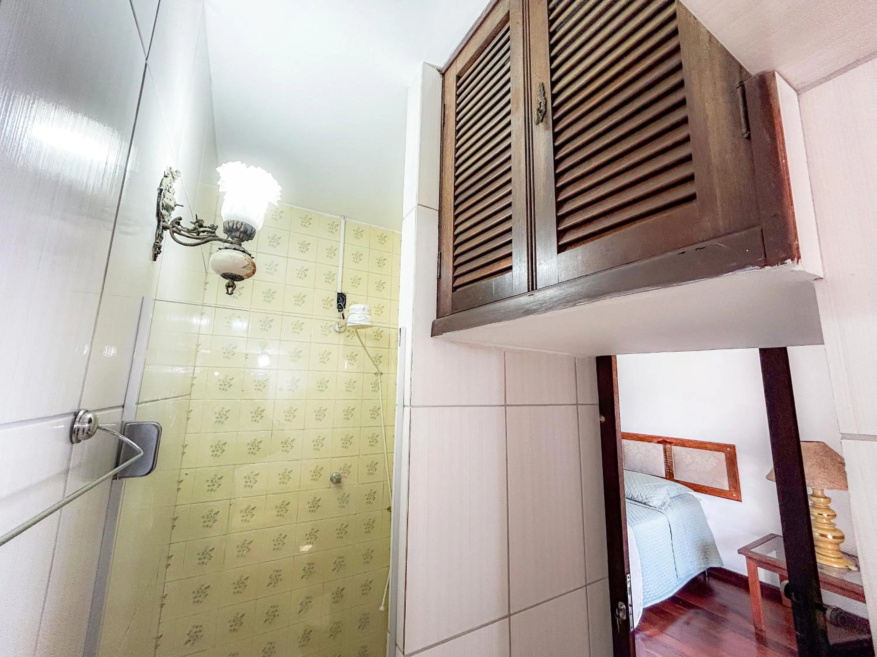 Bed in Pousada dos Sinos