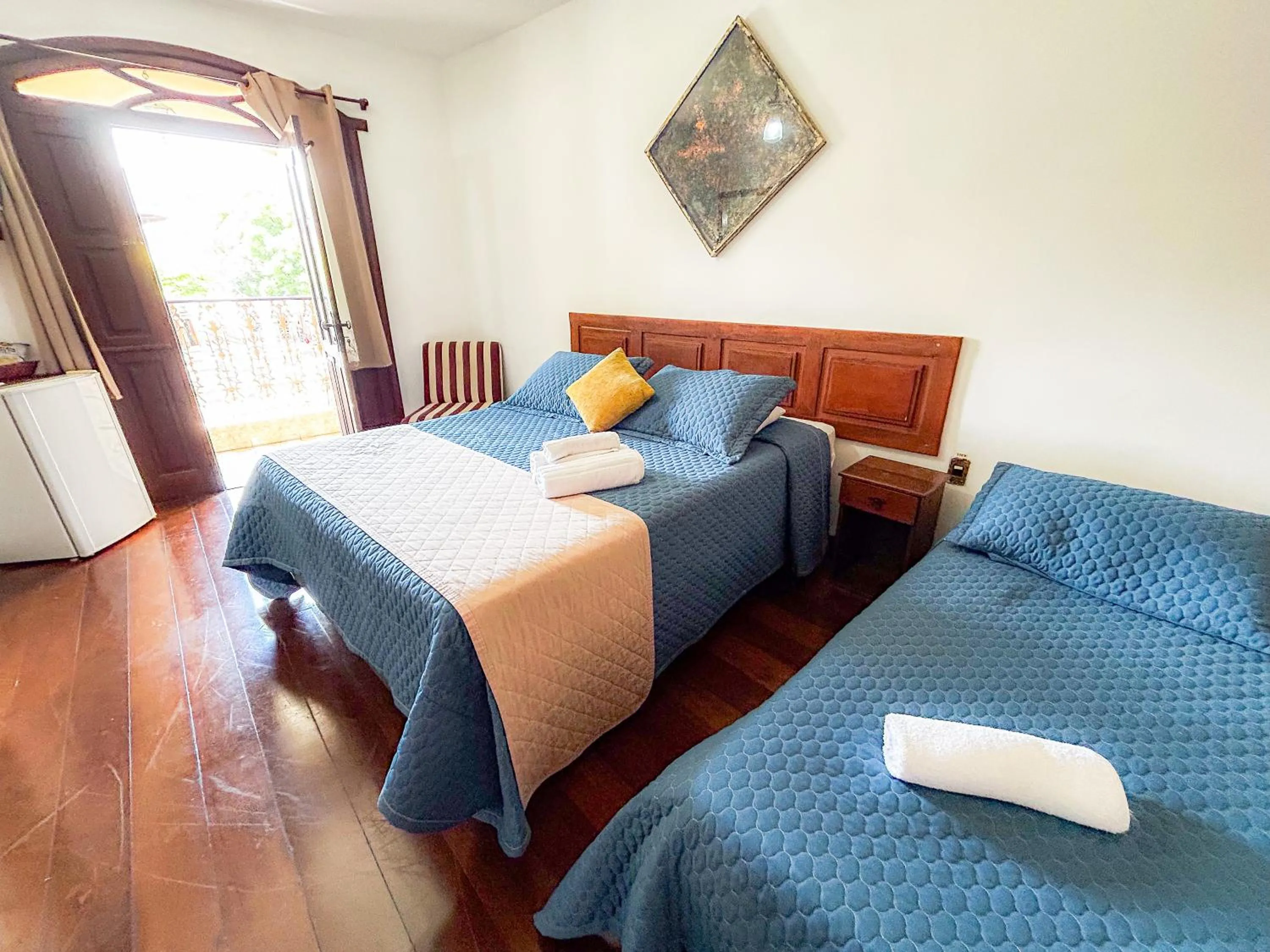 Bed in Pousada dos Sinos