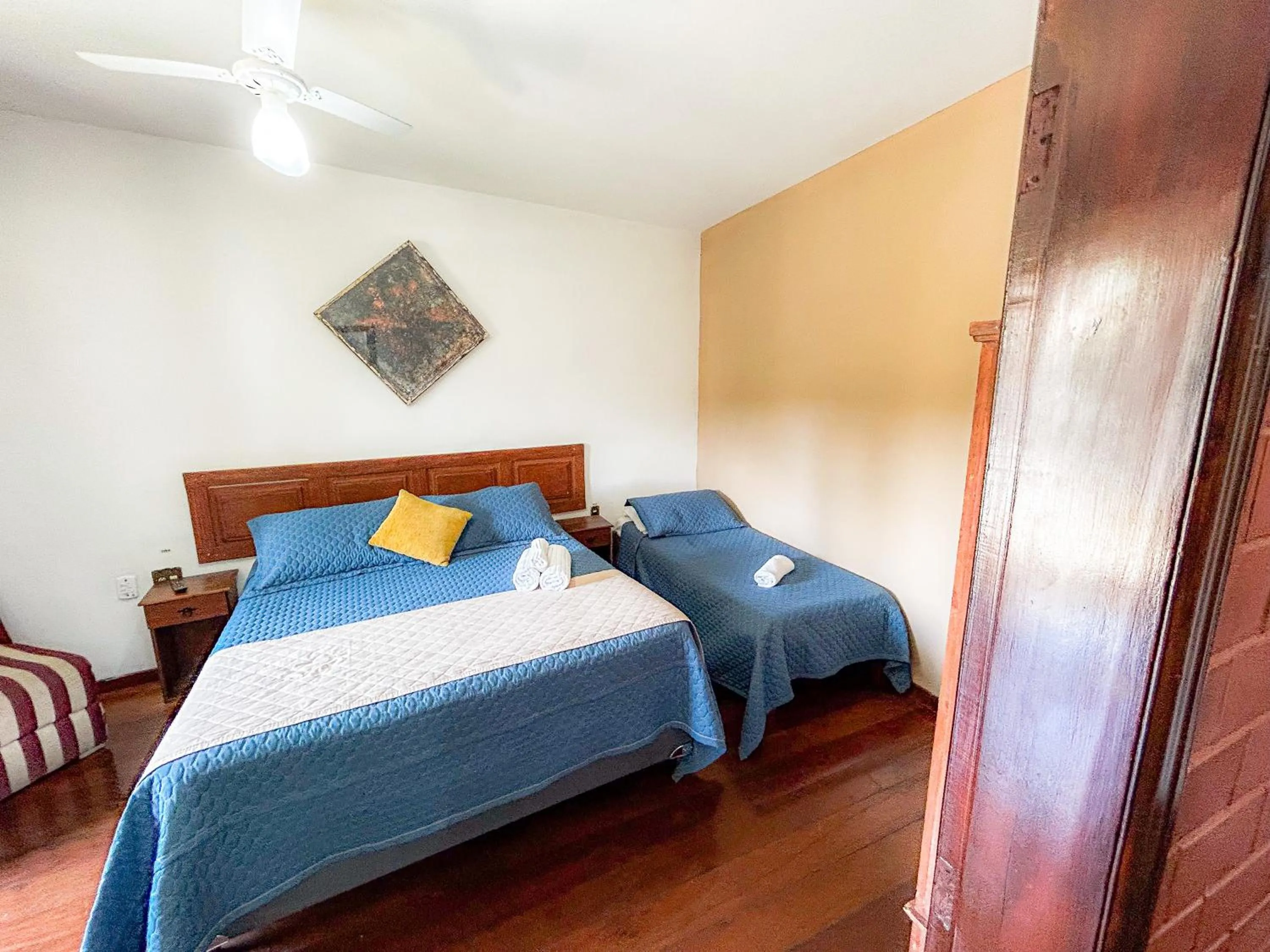 Bed in Pousada dos Sinos