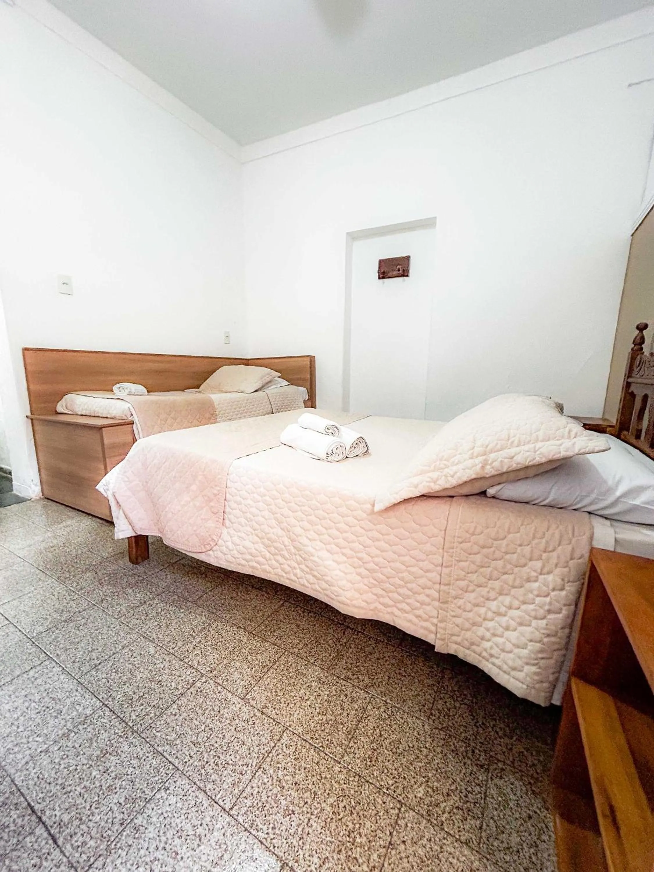 Bed in Pousada dos Sinos