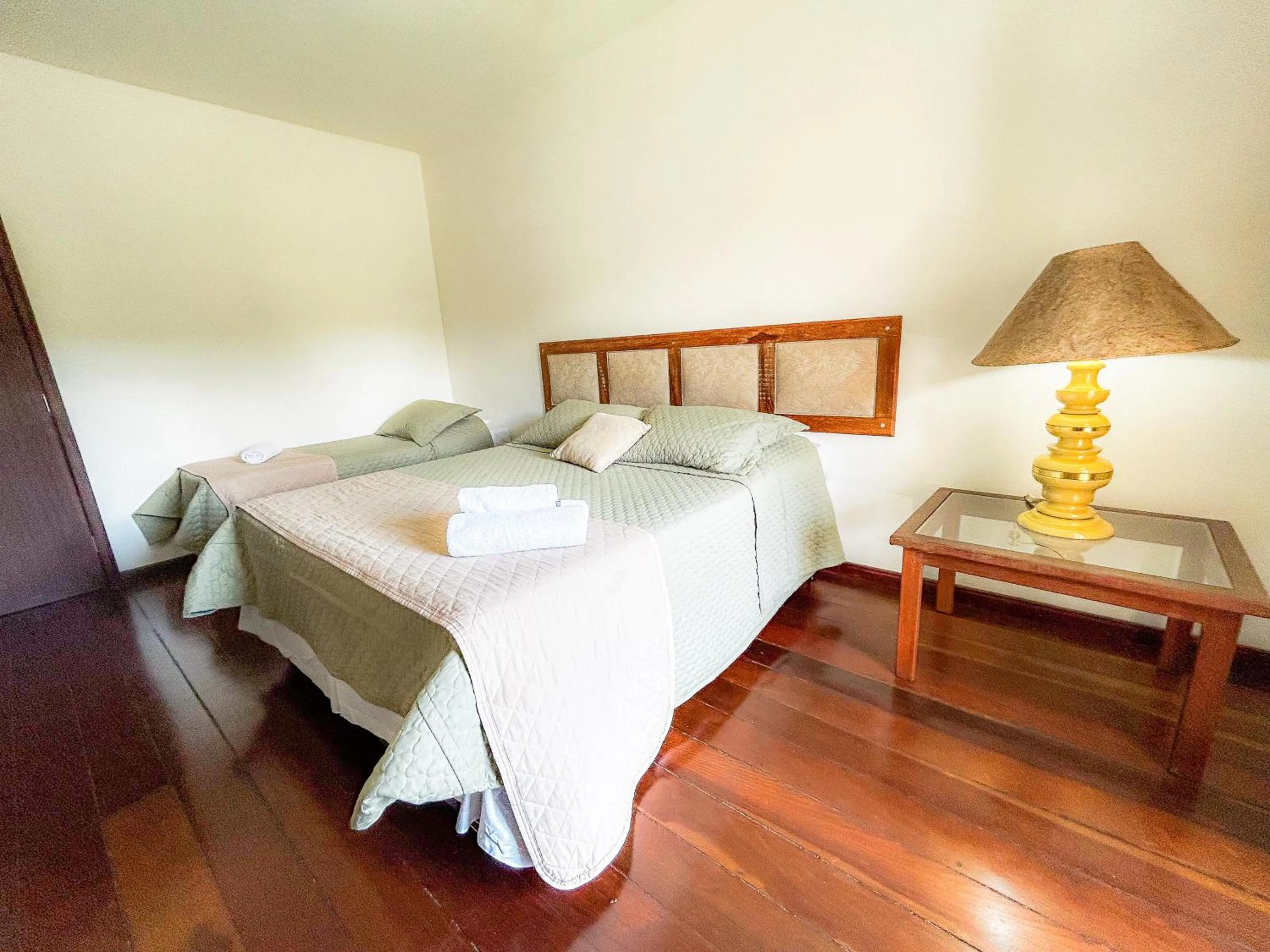 Bed in Pousada dos Sinos