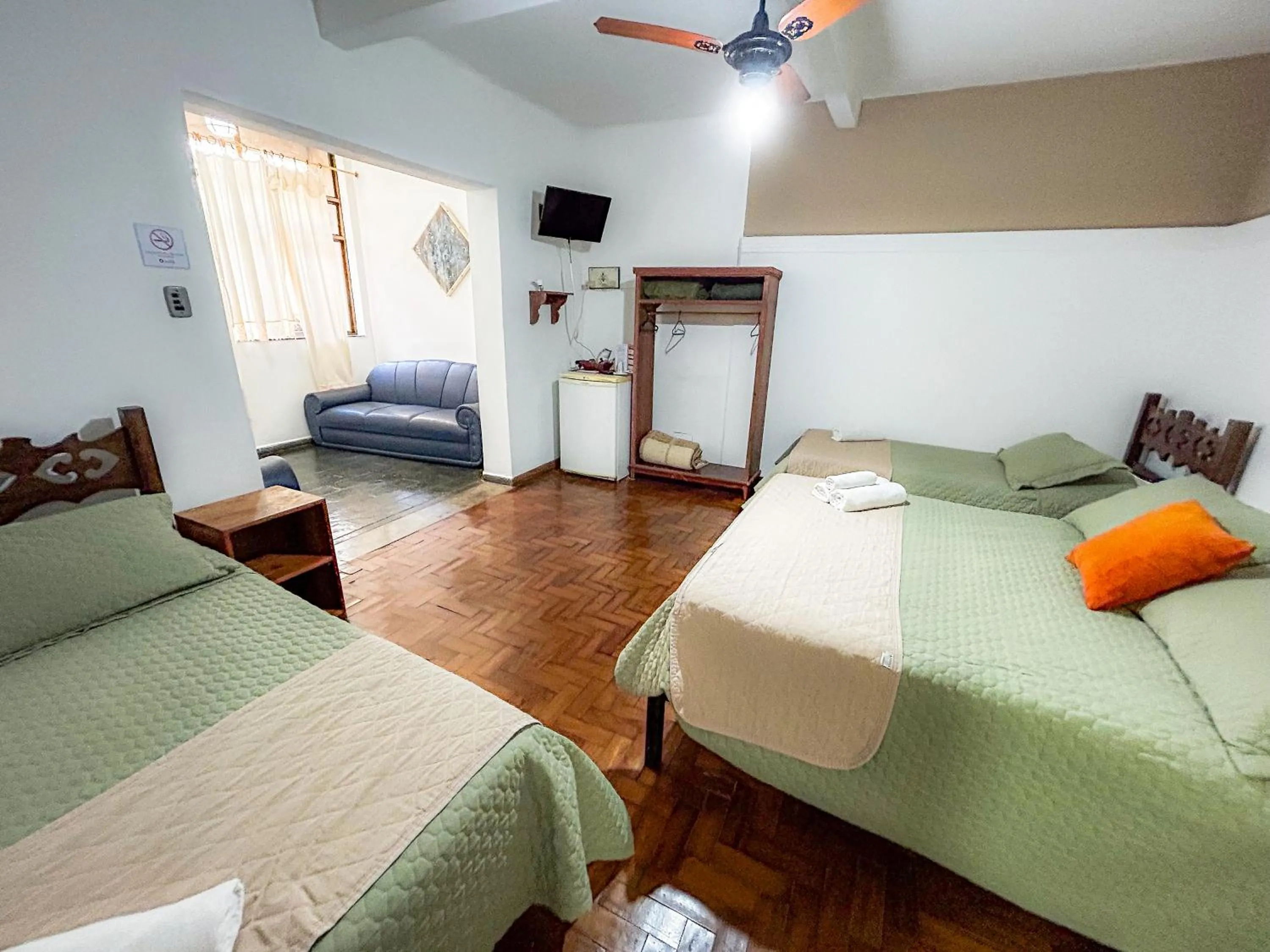 Bed in Pousada dos Sinos