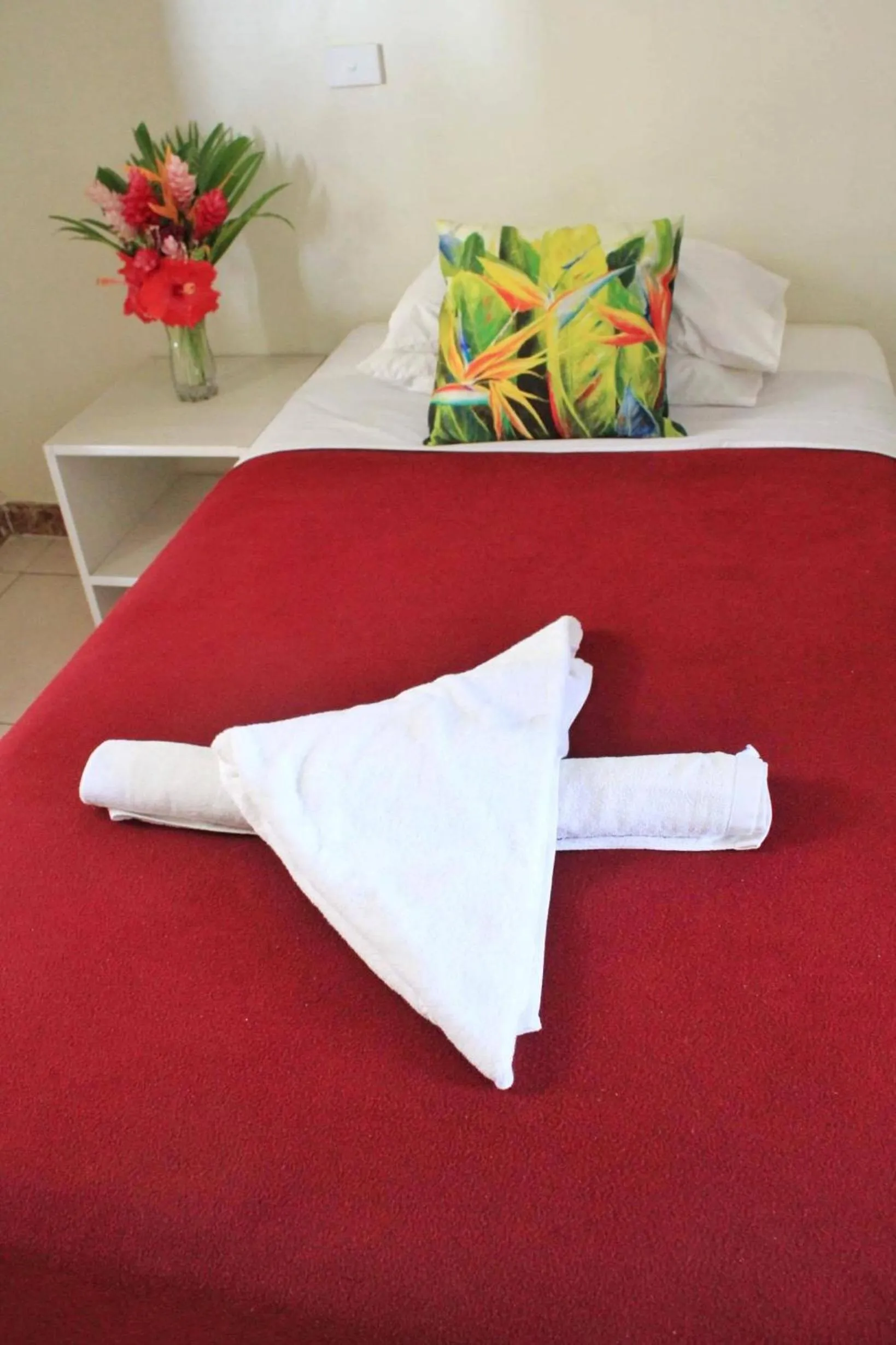 Bed in Pacific Paradise Motel