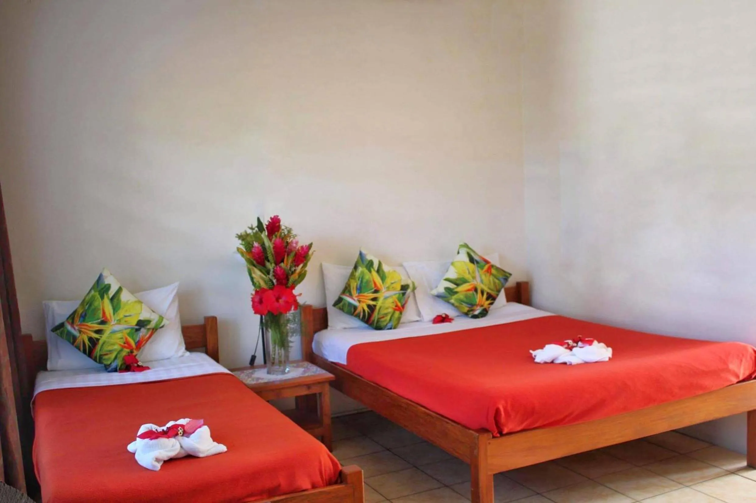 Bed in Pacific Paradise Motel