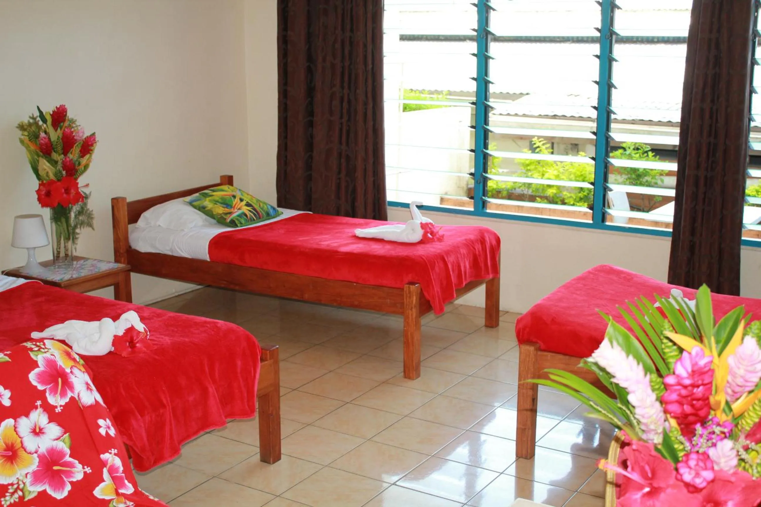 Bed in Pacific Paradise Motel