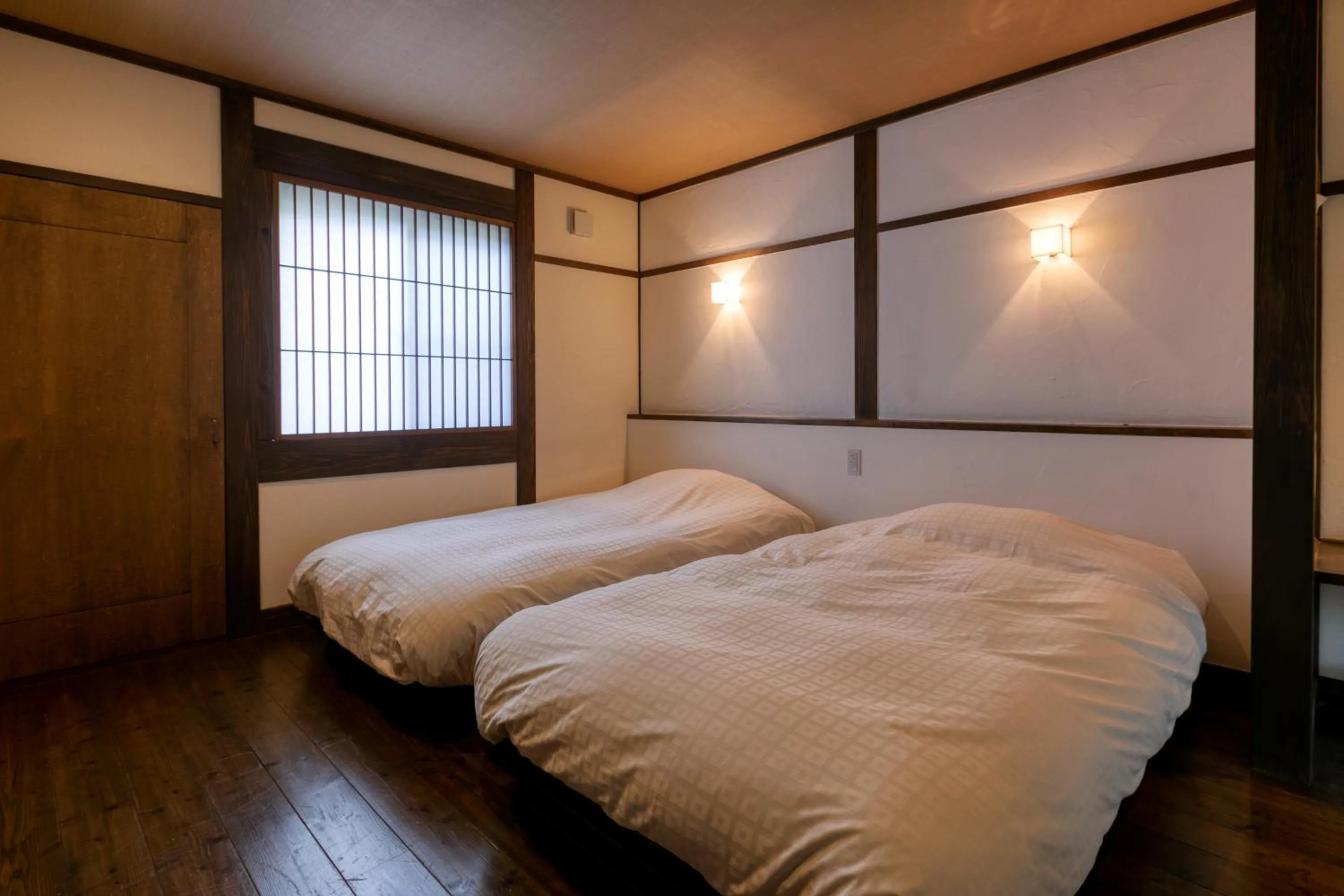 Bed in Yufuin Onsen Toshoan