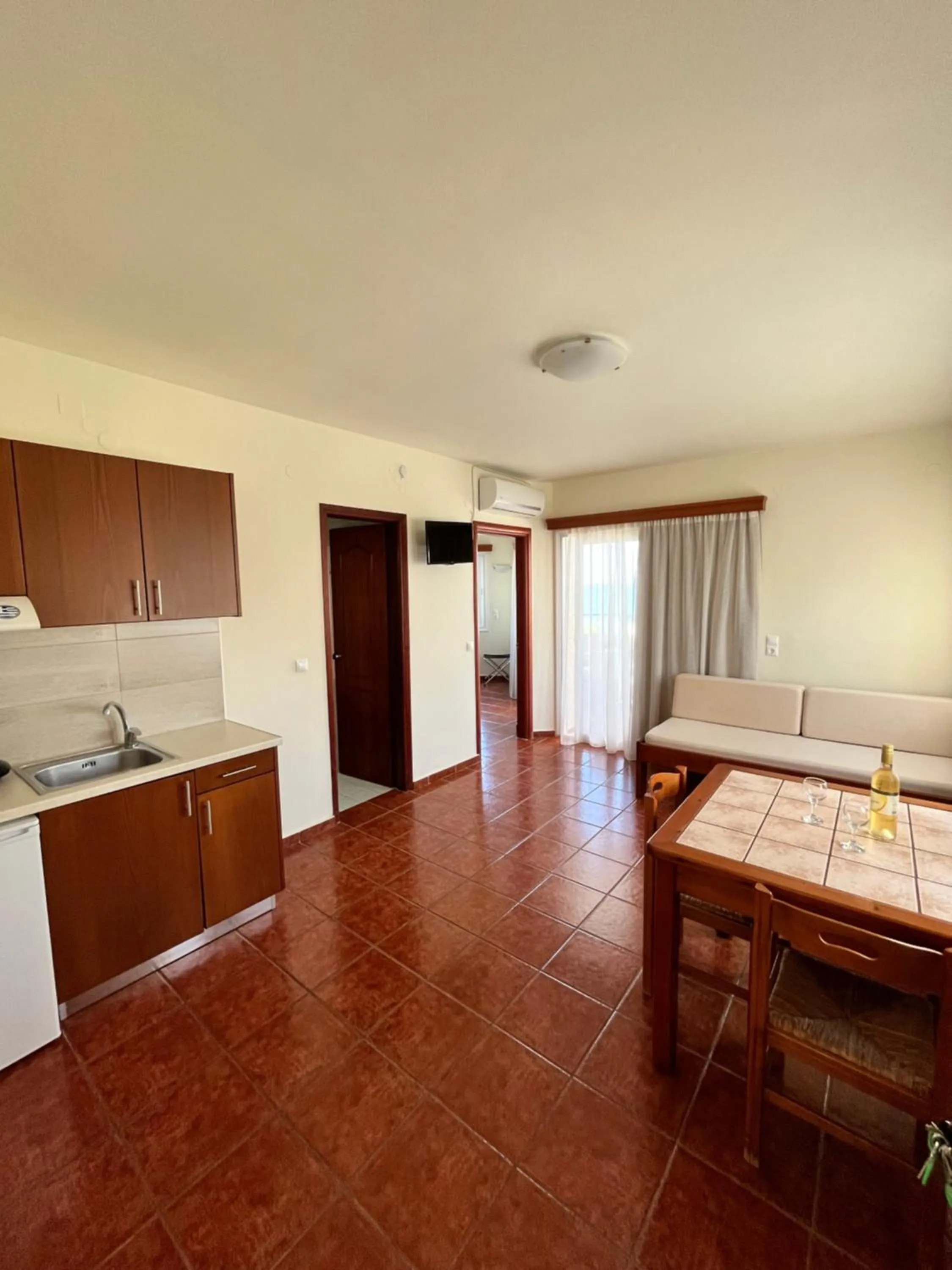 Photo of the whole room in Iolkos Hotel Apartments