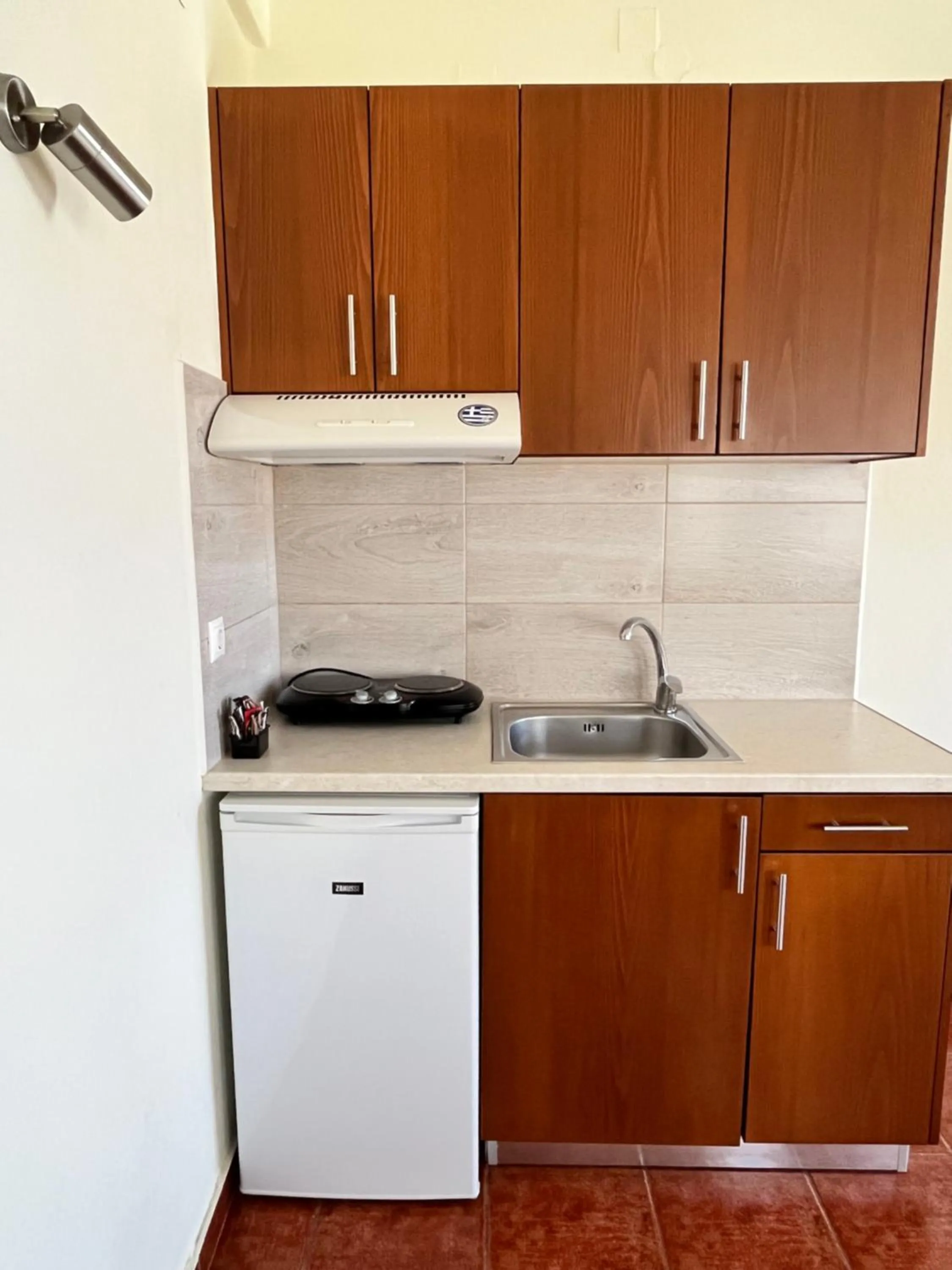 kitchen in Iolkos Hotel Apartments