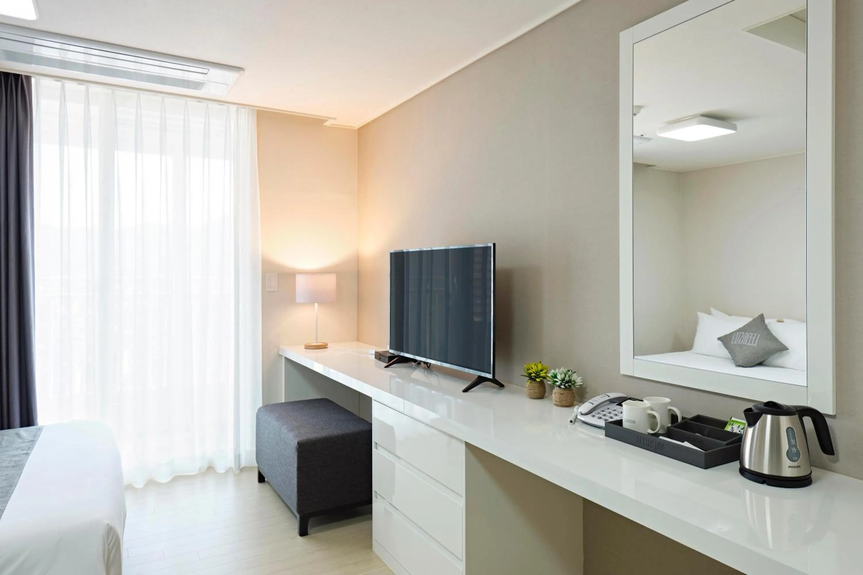 Bed in Geoje Leein Stay Hotel