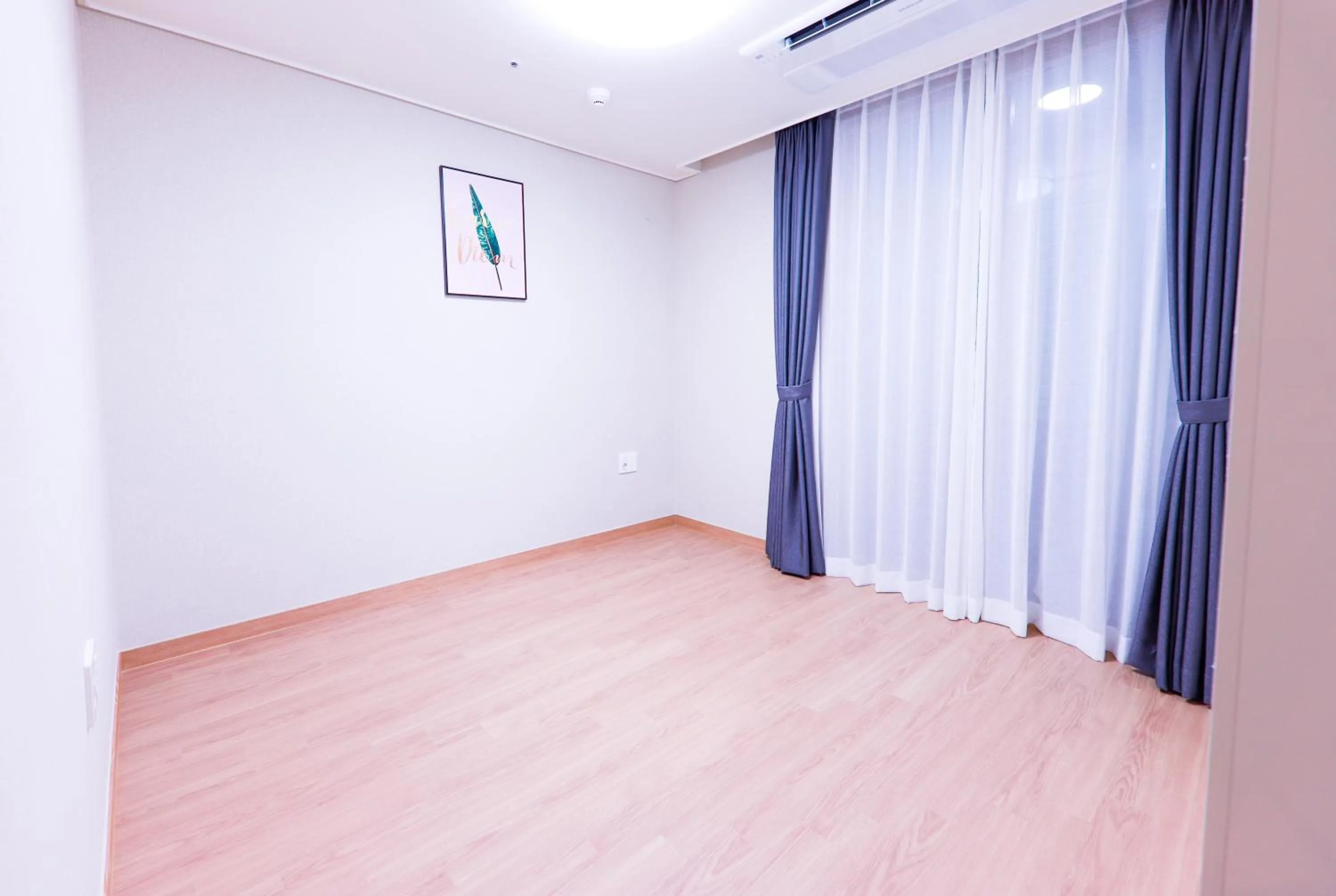 Bed in Geoje Leein Stay Hotel