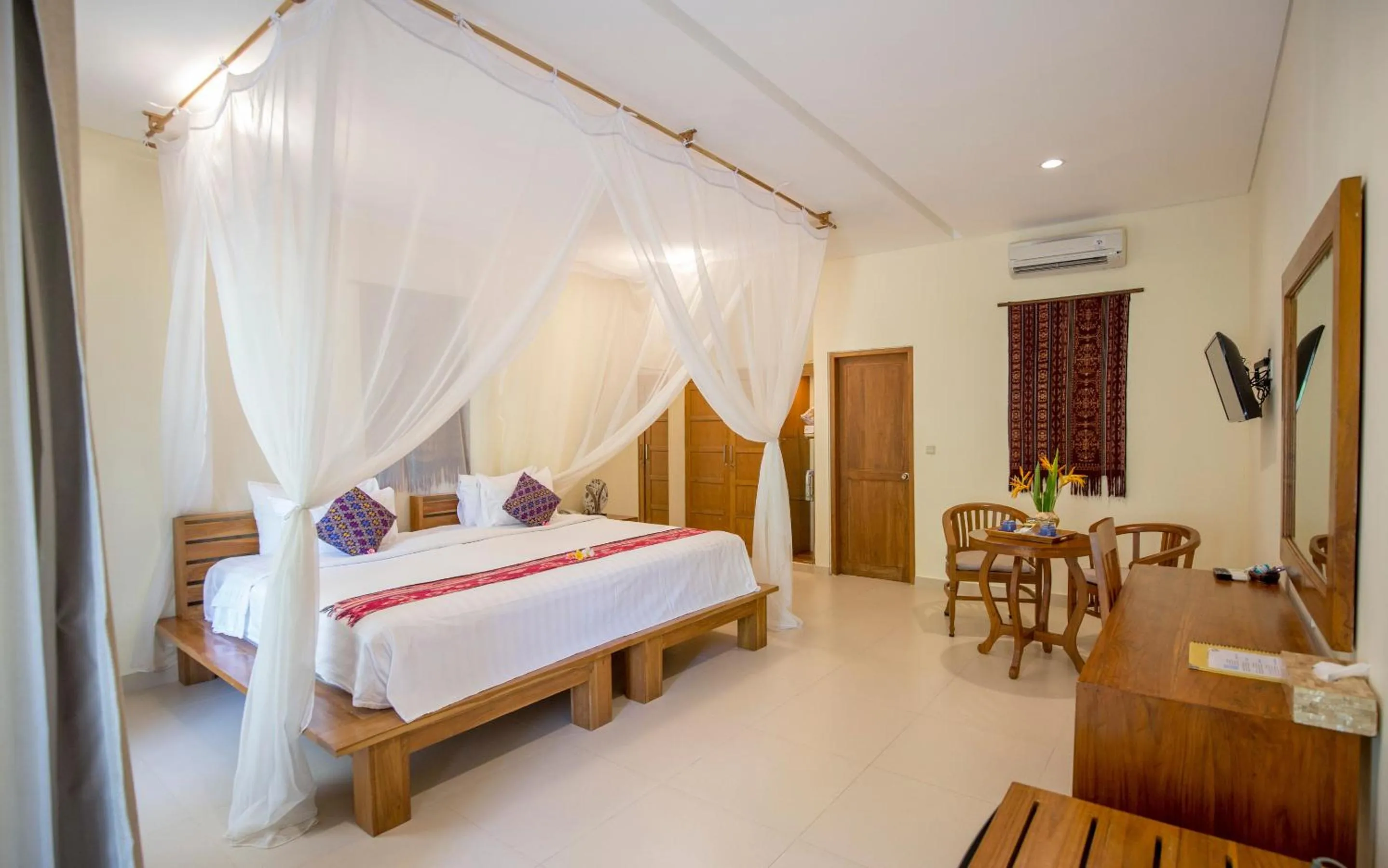 Bed in Puri Sari Beach Hotel
