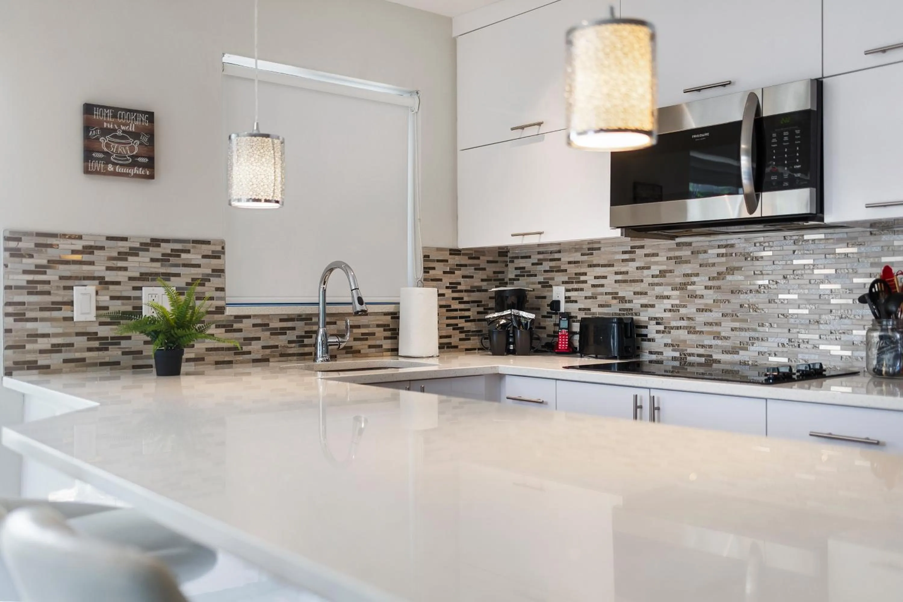 Kitchen or kitchenette in Alani Bay Condos