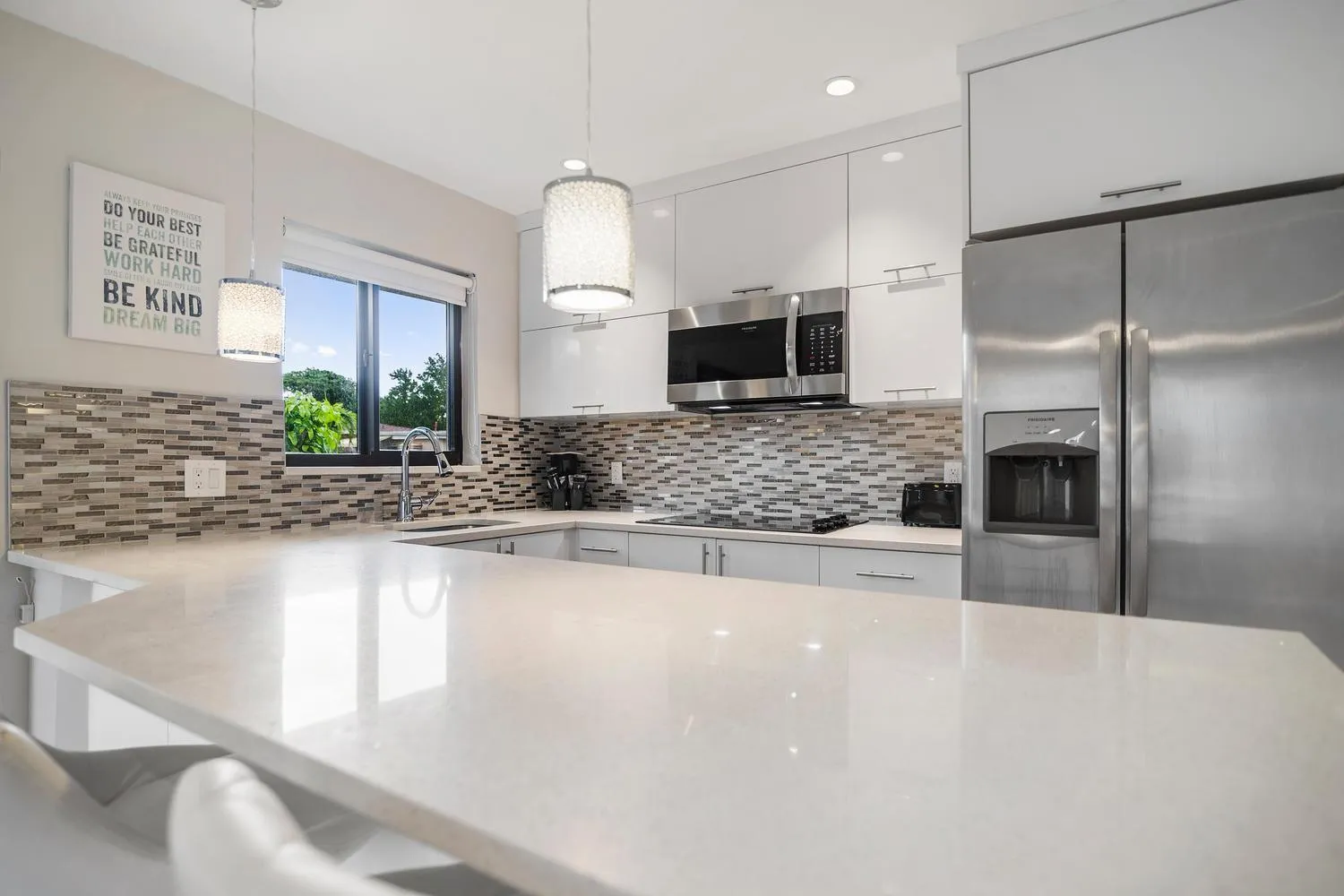 Kitchen or kitchenette in Alani Bay Condos