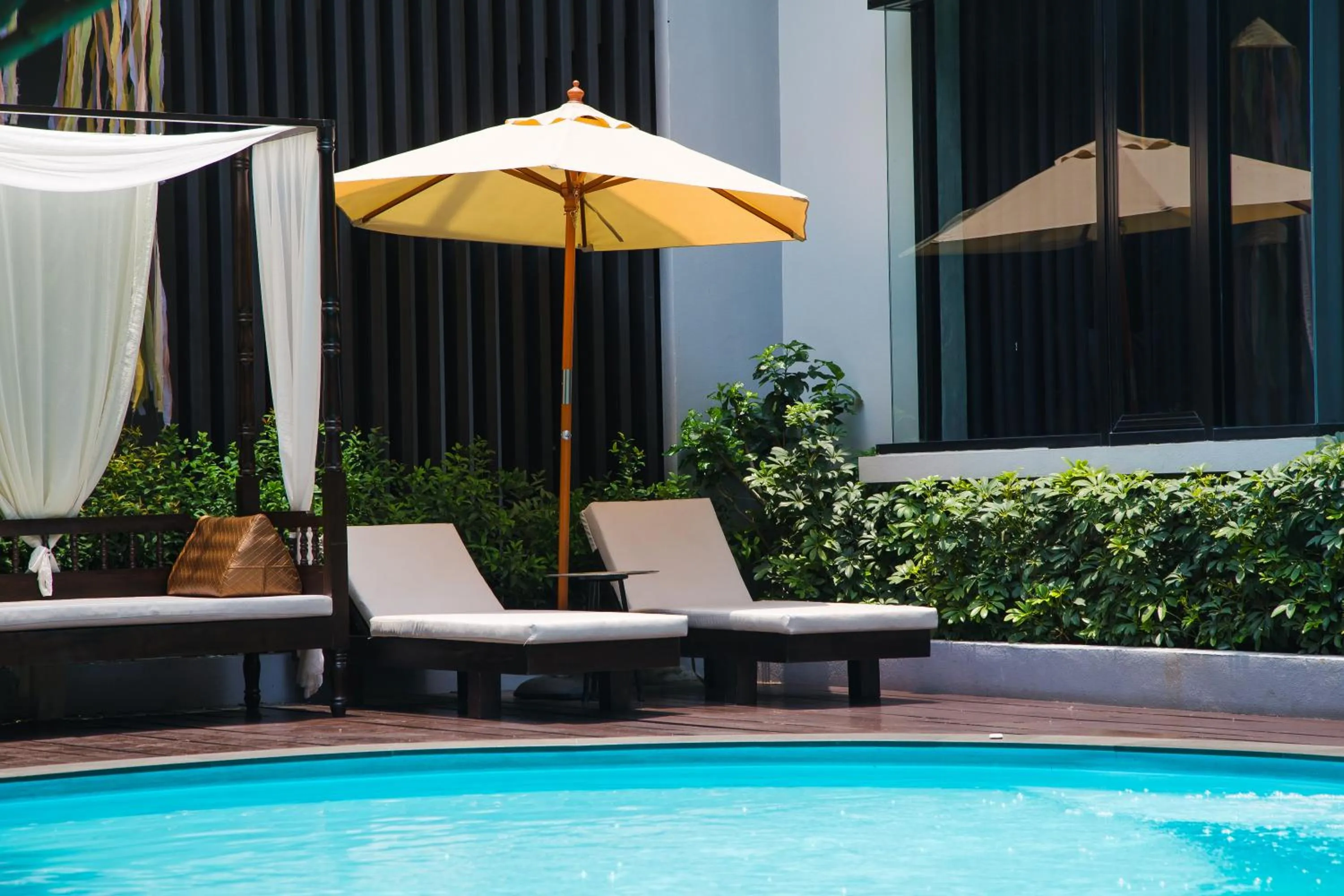 Swimming pool in NAI YA Hotel -SHA Extra Plus