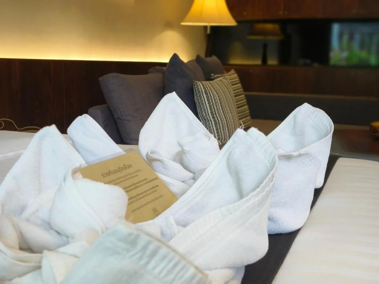 towels, Bed in NAI YA Hotel -SHA Extra Plus