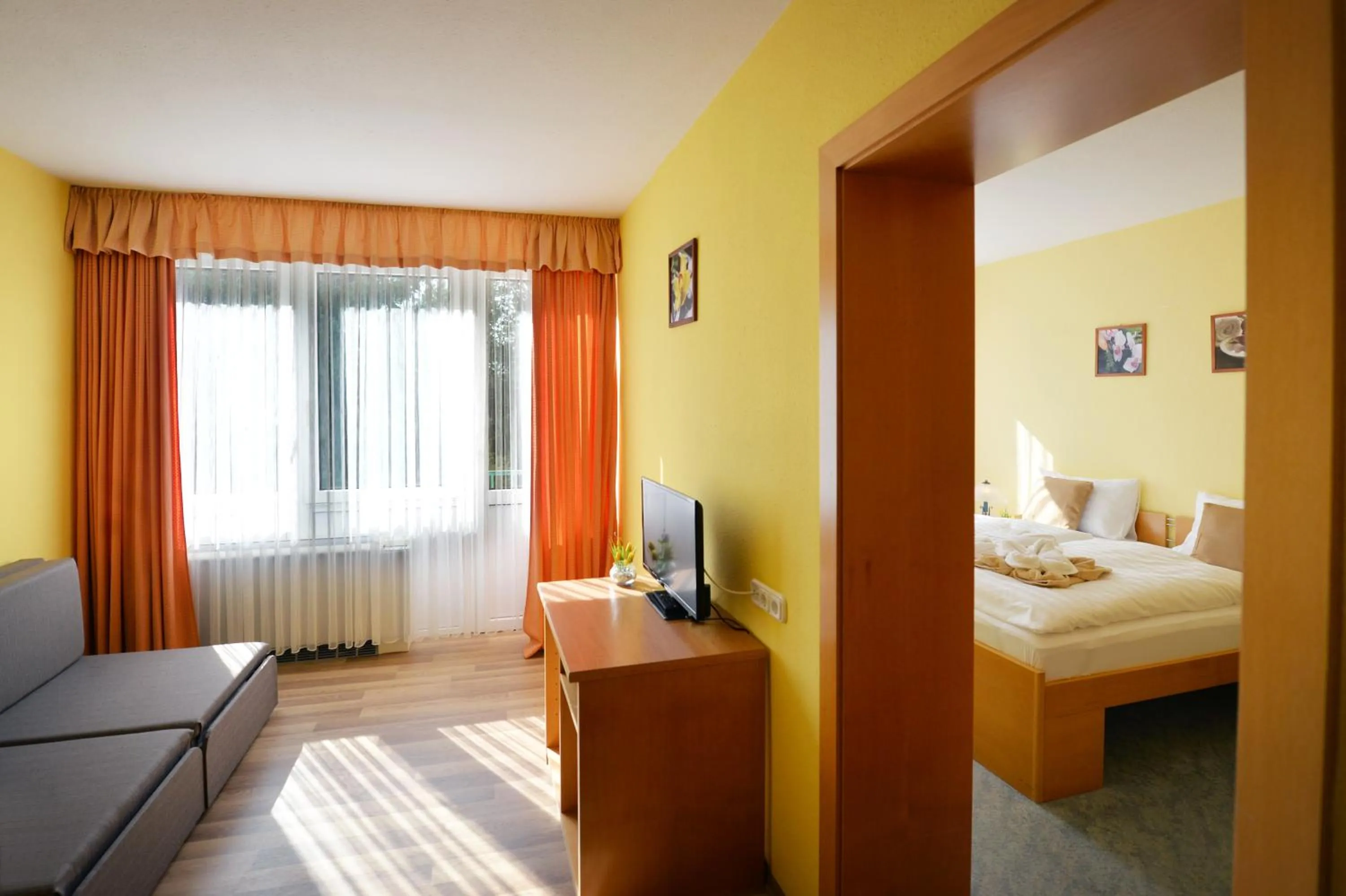 Living room, Bed in Panorama Hotel Noszvaj