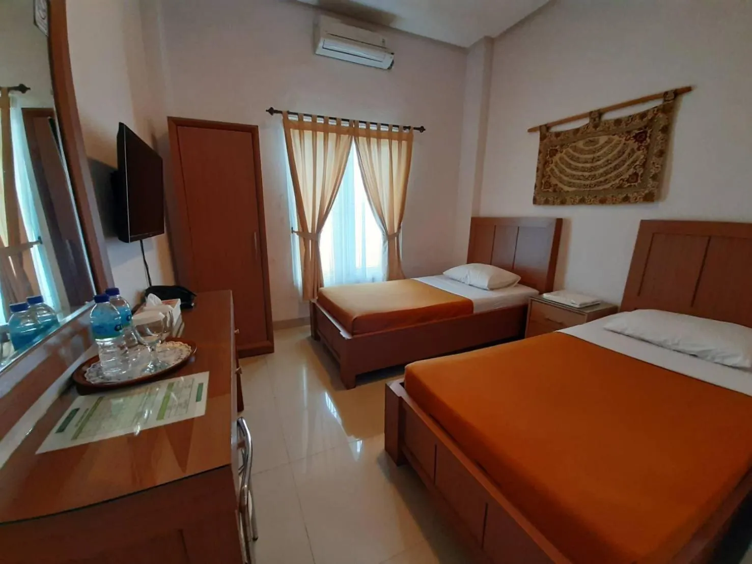 Bed in The Sriwijaya Hotel - Halal Hotel