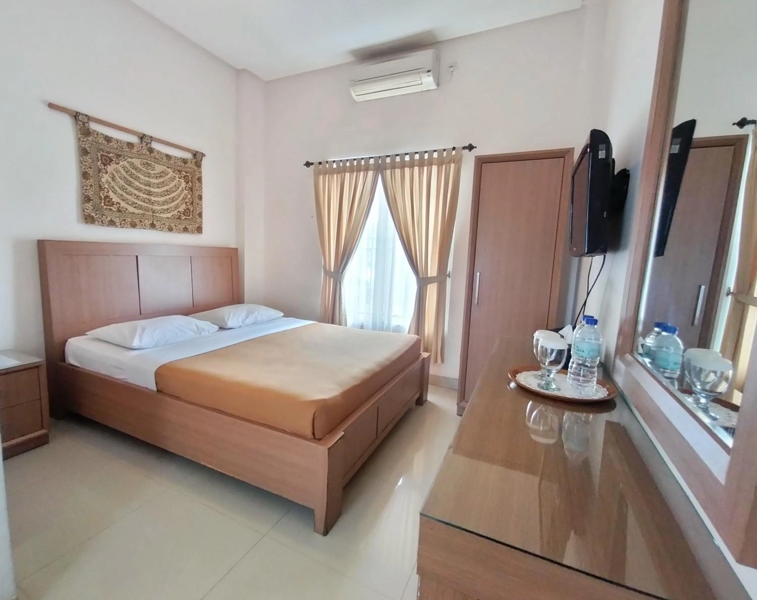 Bed in The Sriwijaya Hotel - Halal Hotel