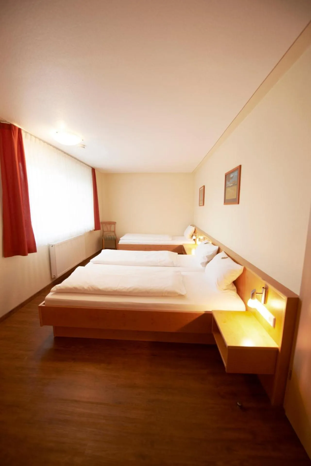 Photo of the whole room, Bed in Autenrieder Gästehaus Schlossbräu