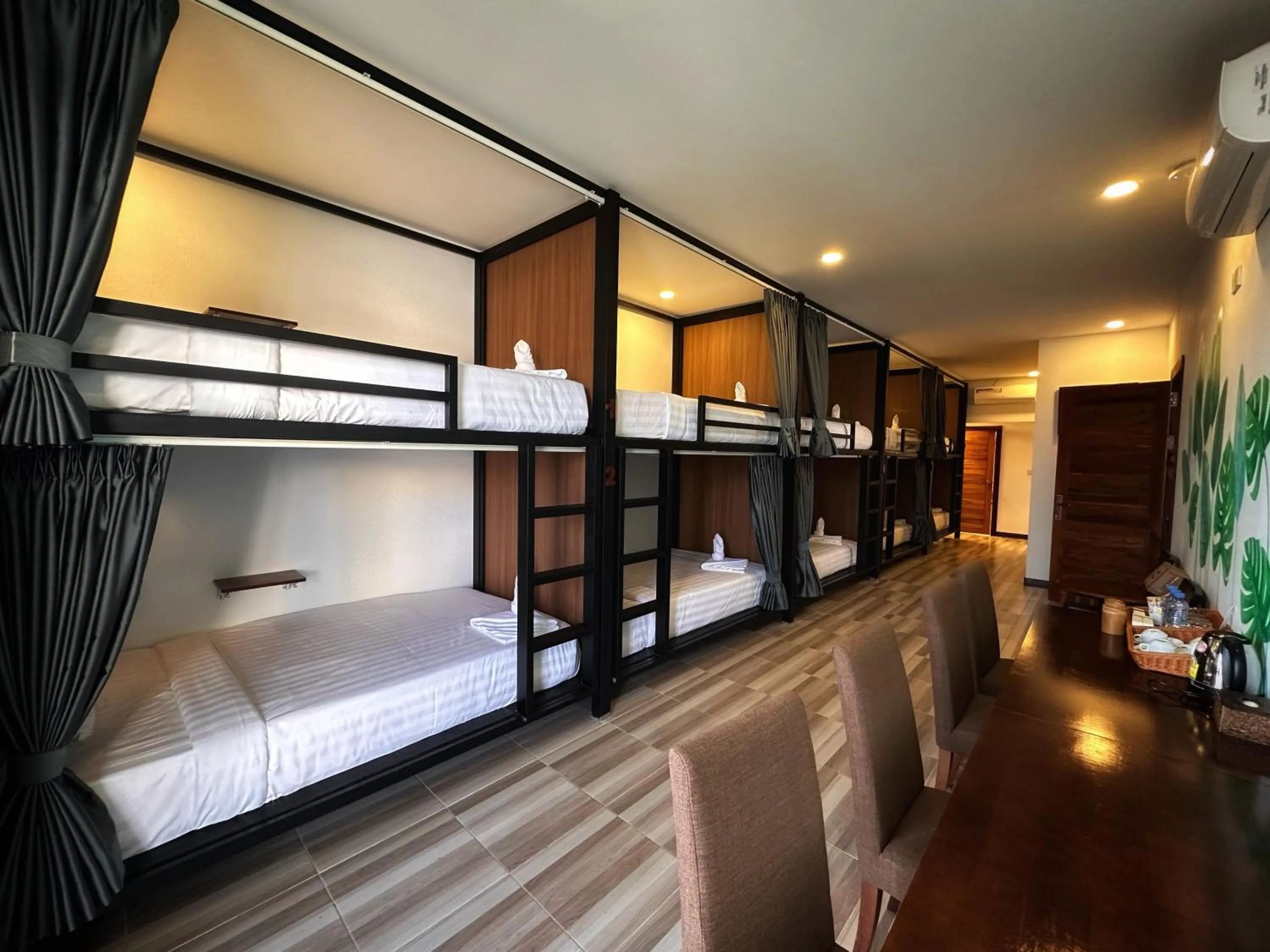 Bed in Monsoon Riverside Hotel