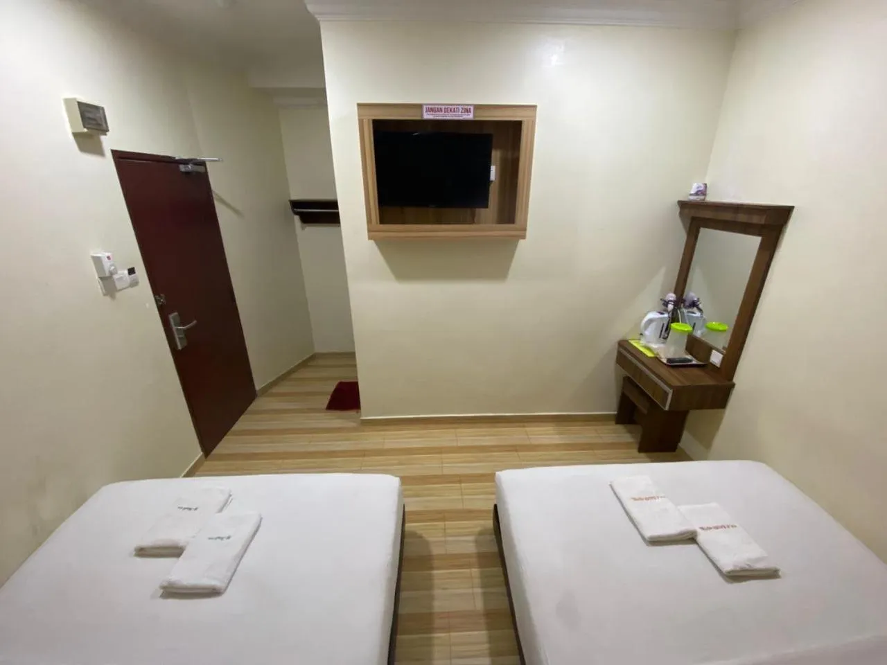 Bed in Haji Saudi Hotel