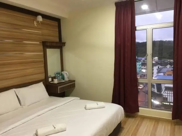 Bed in Haji Saudi Hotel