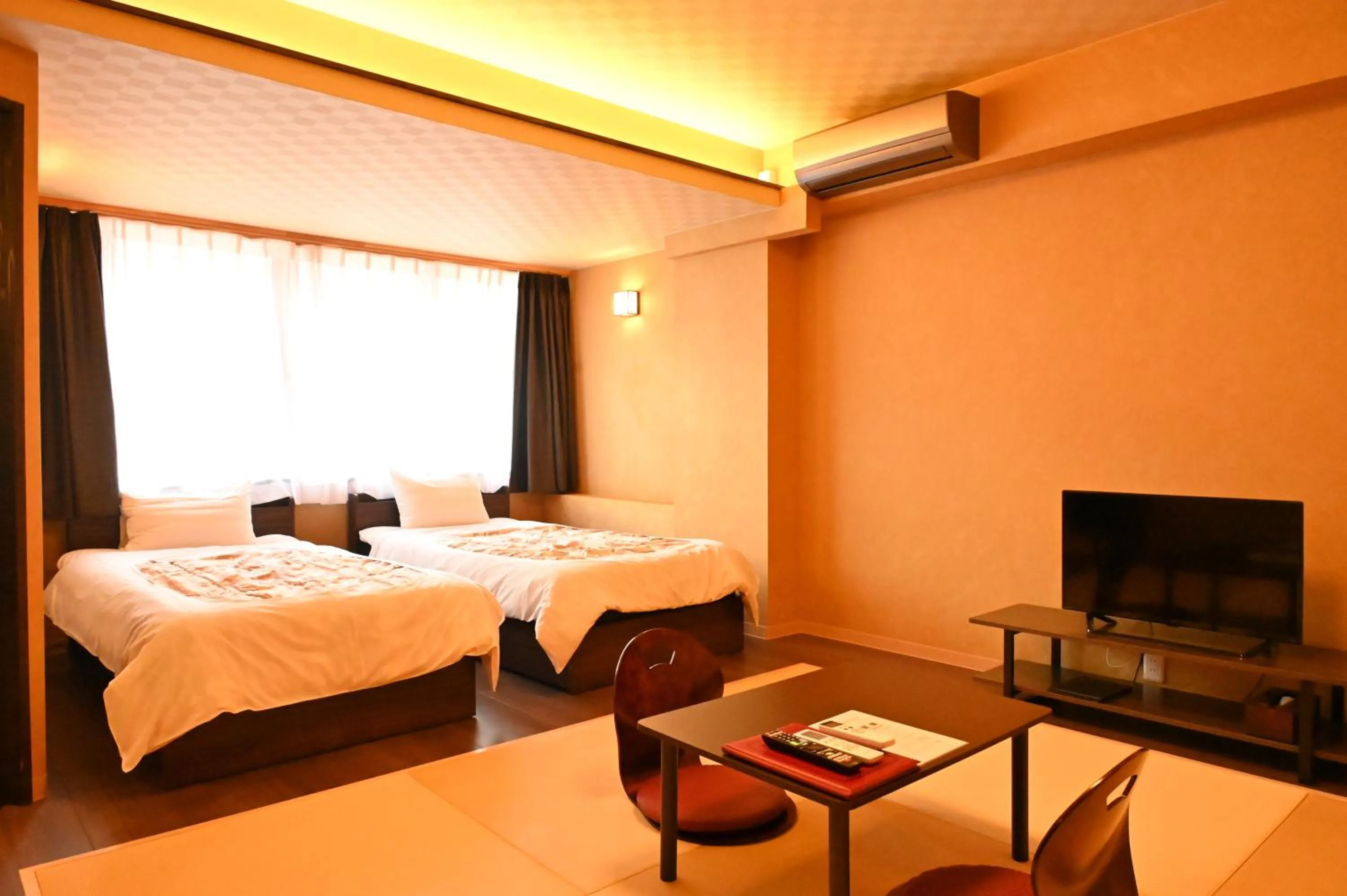 Bed in Unzen Sky Hotel