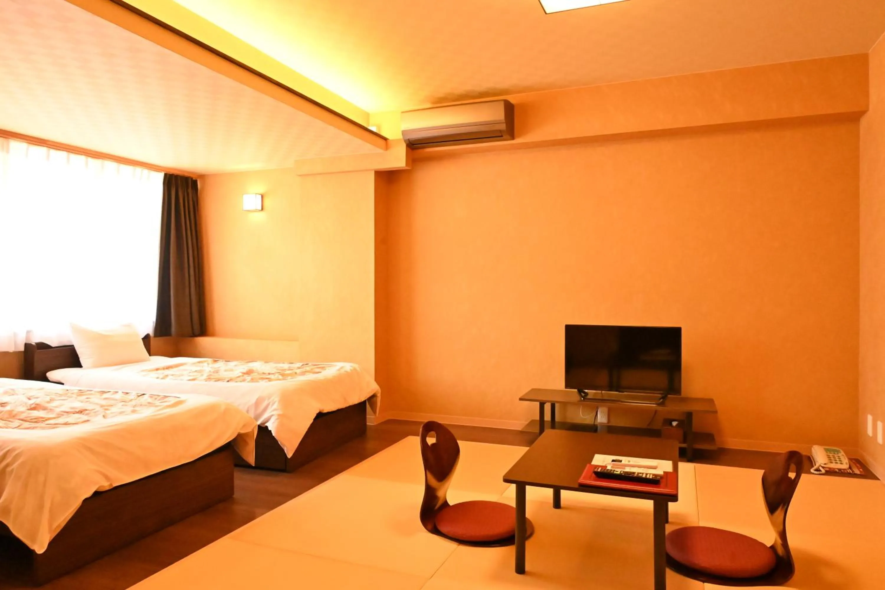 Bed in Unzen Sky Hotel