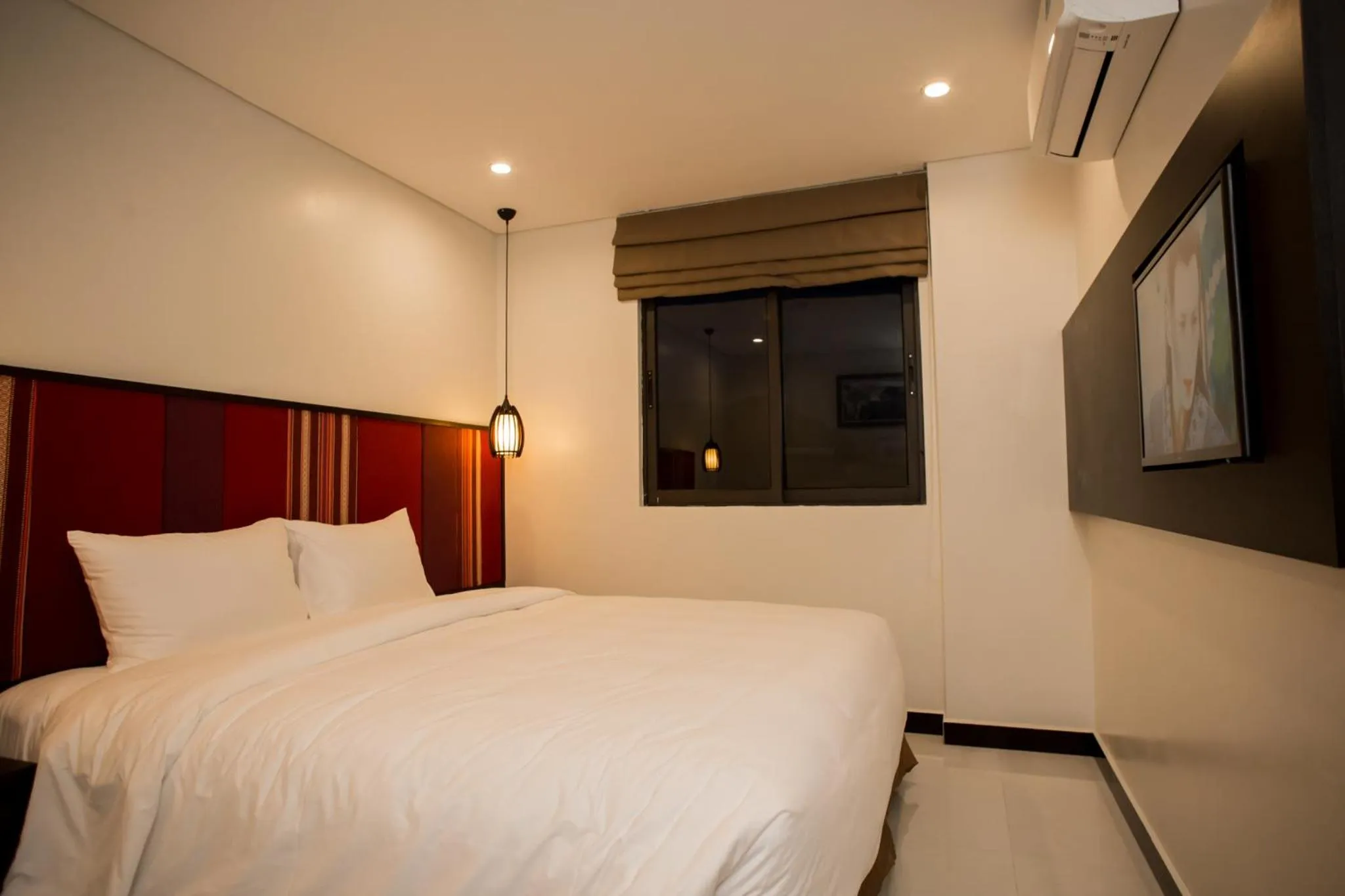 Bed in Max Boutique Hotel