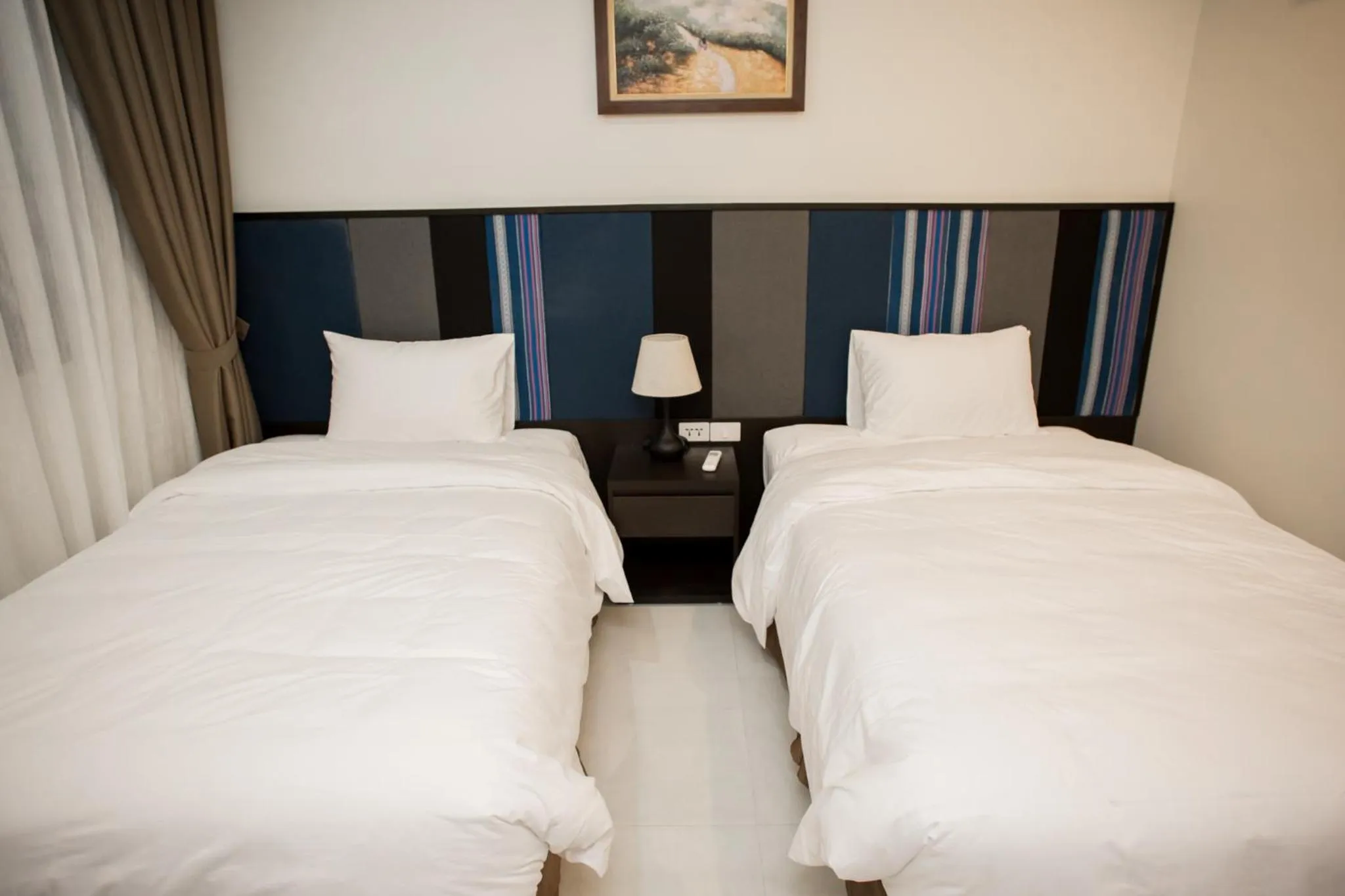 Bed in Max Boutique Hotel
