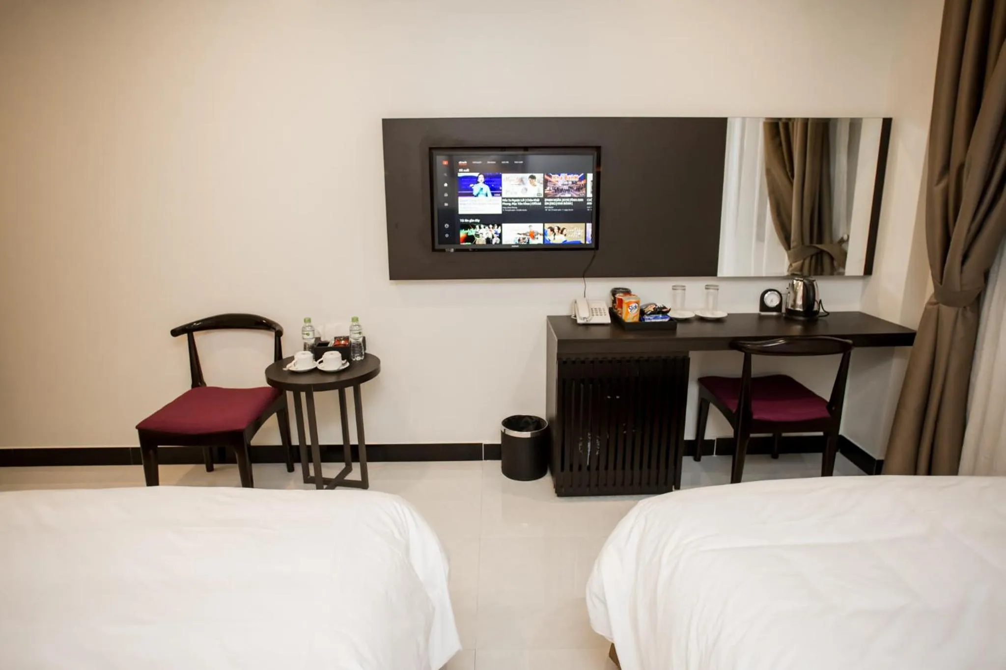 Bed in Max Boutique Hotel