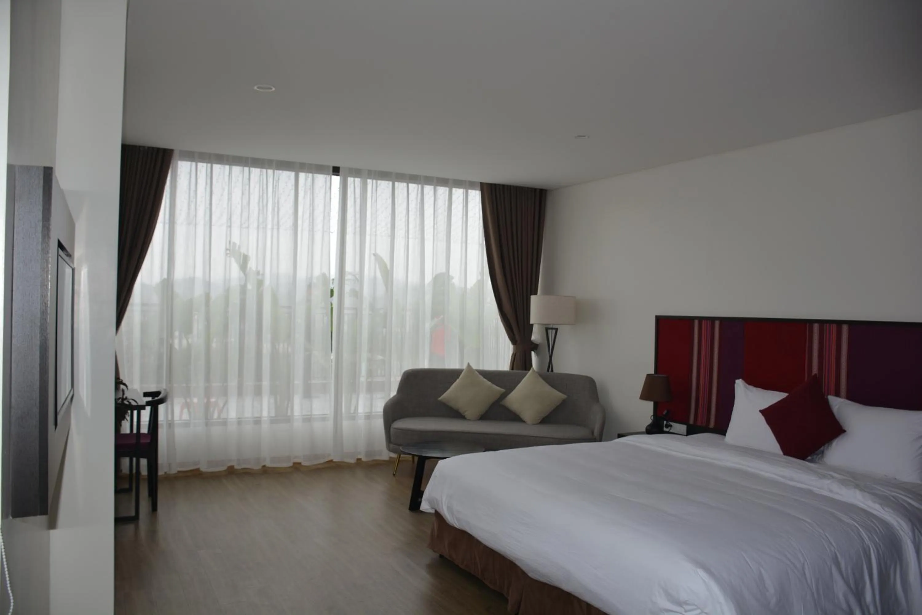 Bed in Max Boutique Hotel