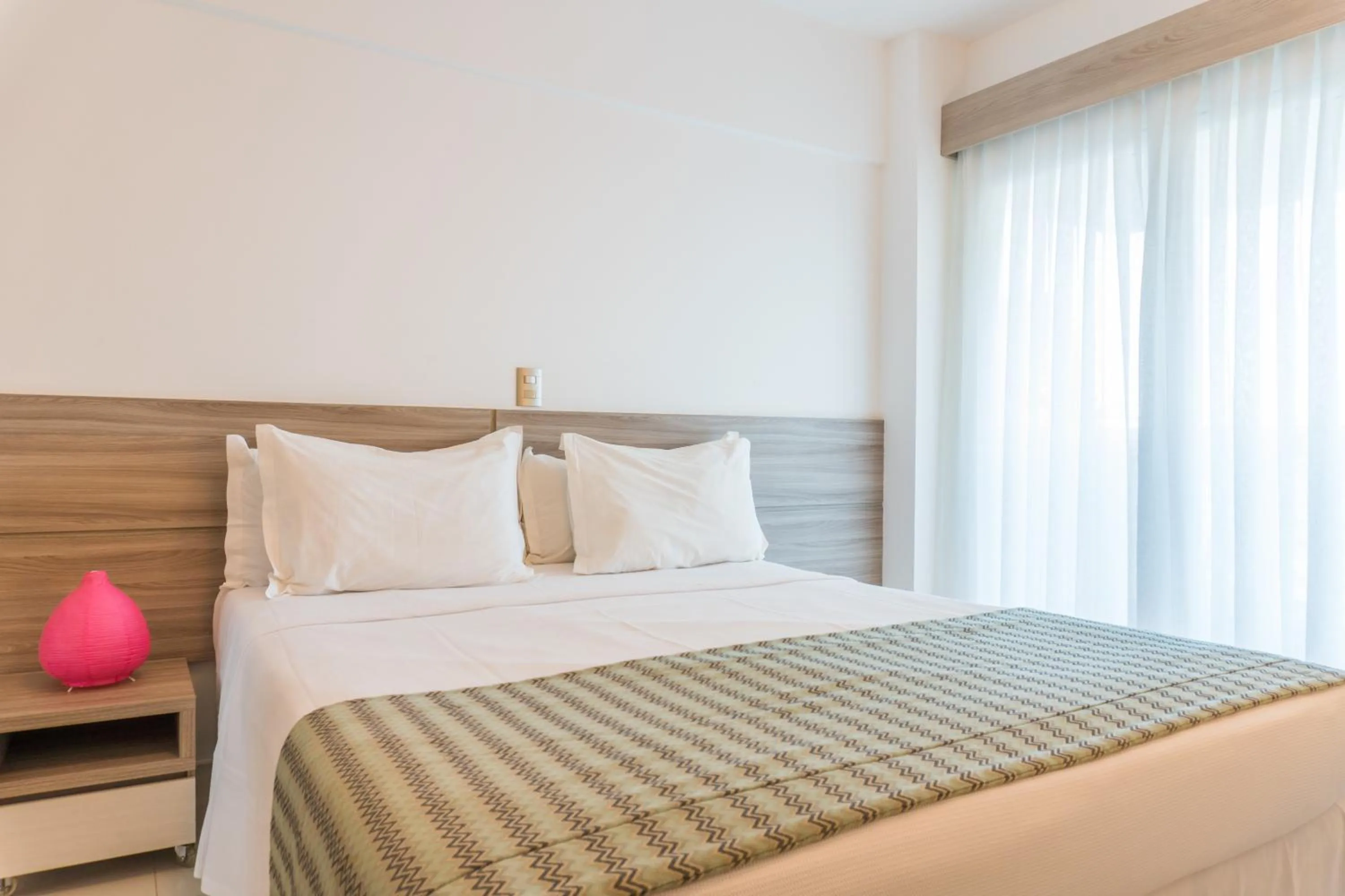 Photo of the whole room, Bed in Kristie Resort Natal Hotel