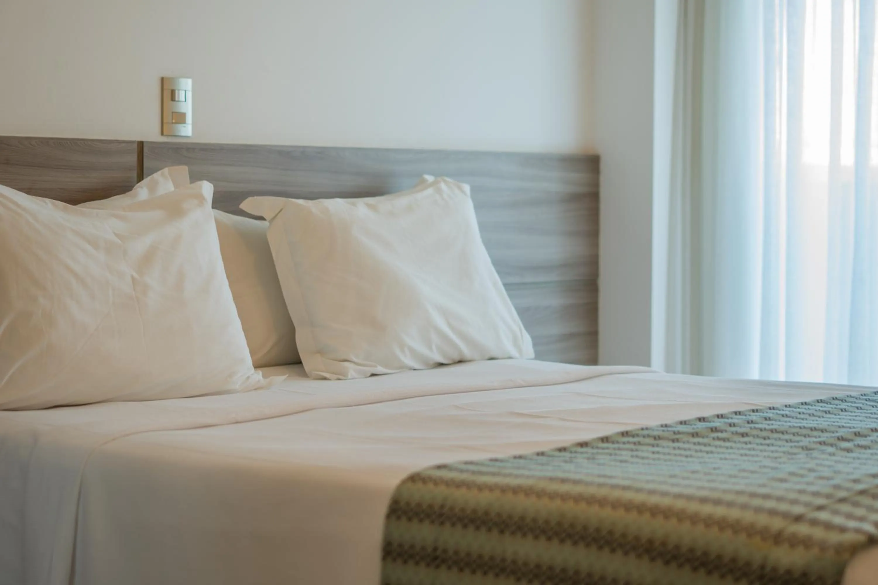 Photo of the whole room, Bed in Kristie Resort Natal Hotel