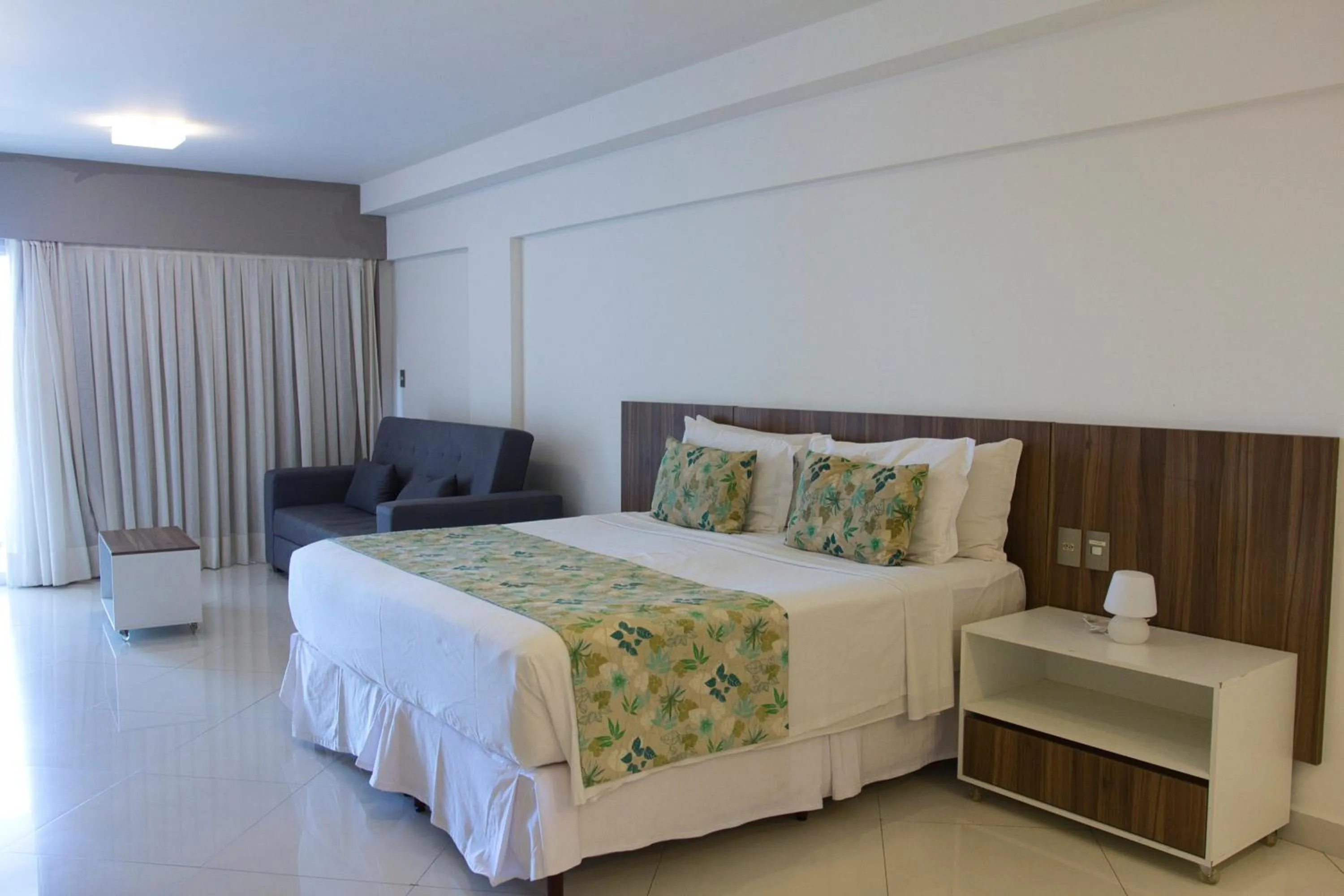 Bed in Kristie Resort Natal Hotel